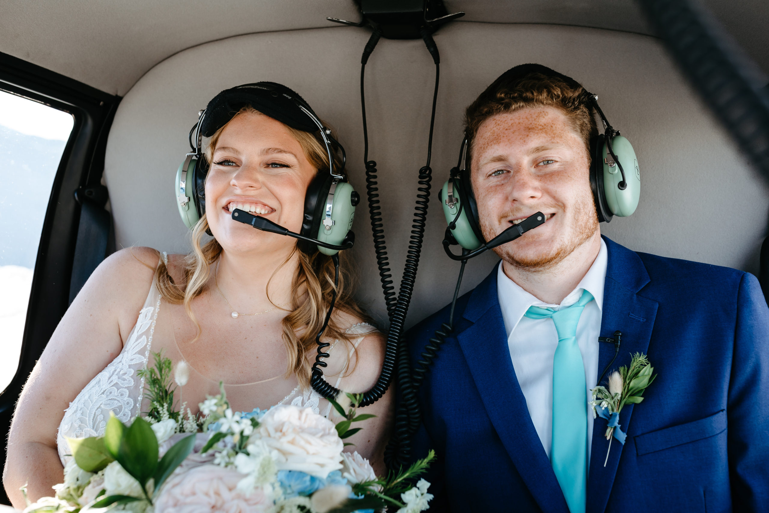 Bride and Groom in Helicopter for Alaskan Elopement 