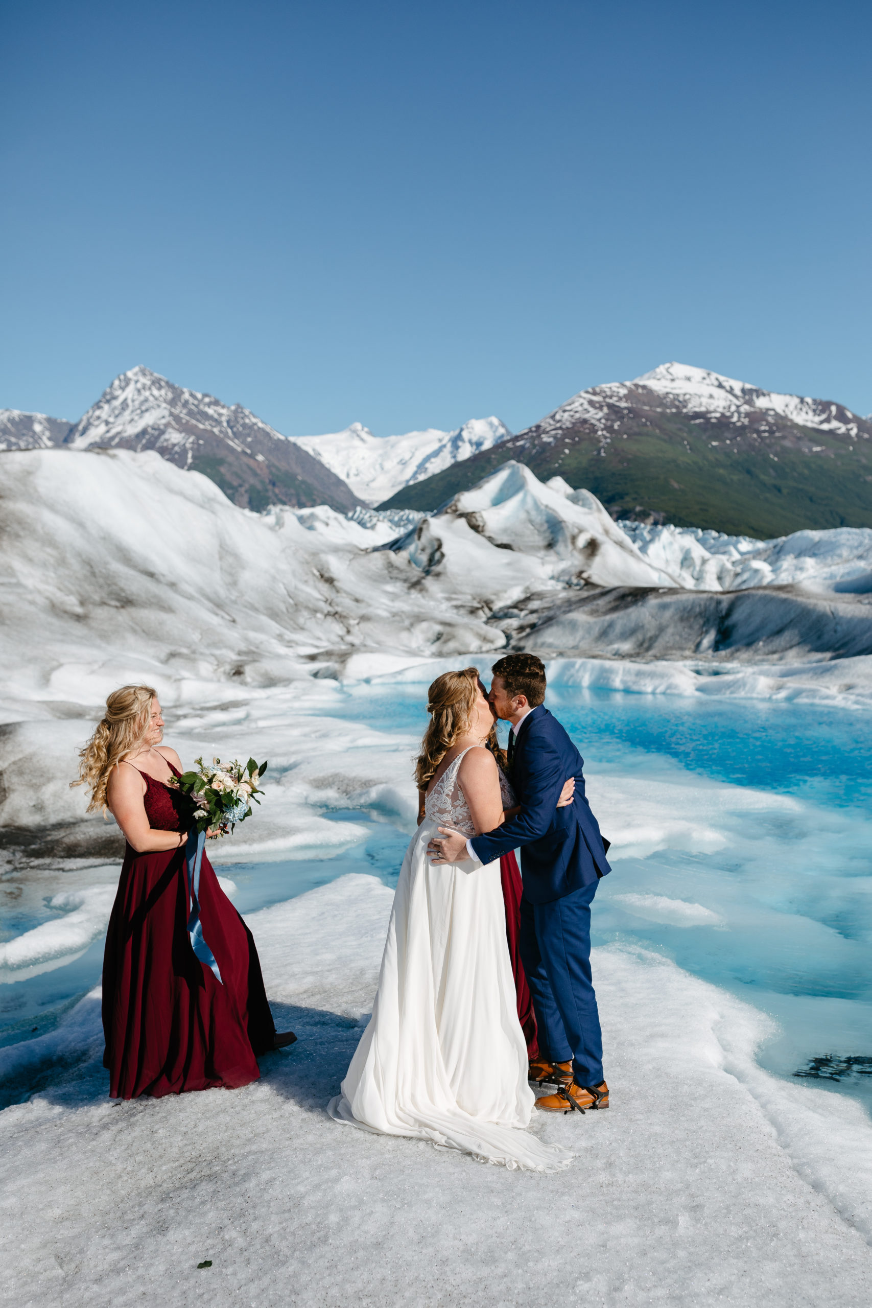 Bride and Groom's First Kiss during Alaskan Glacier Ceremony 
