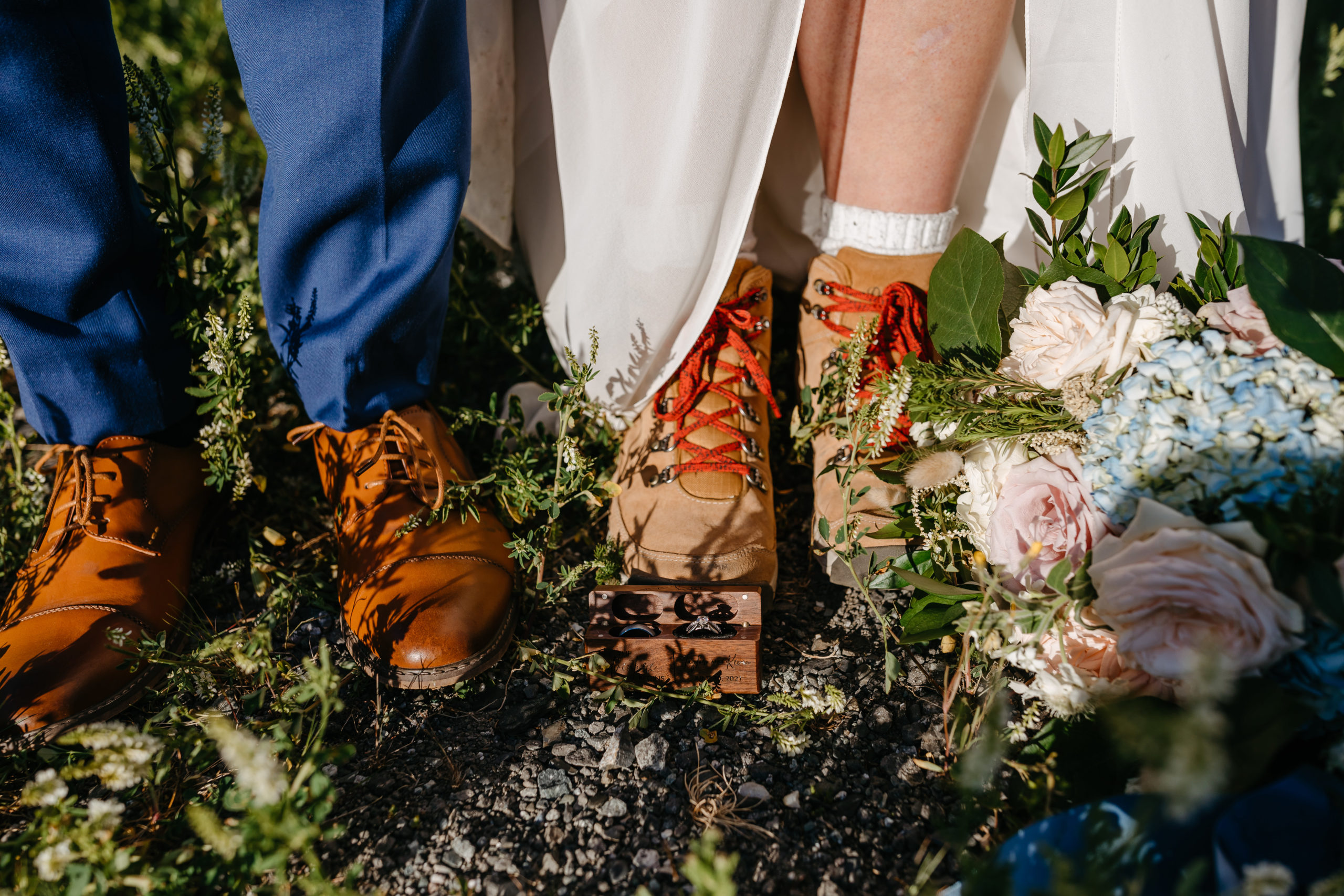 Bride and Grooms Shoes with the Bouquet and rings detailed shots 