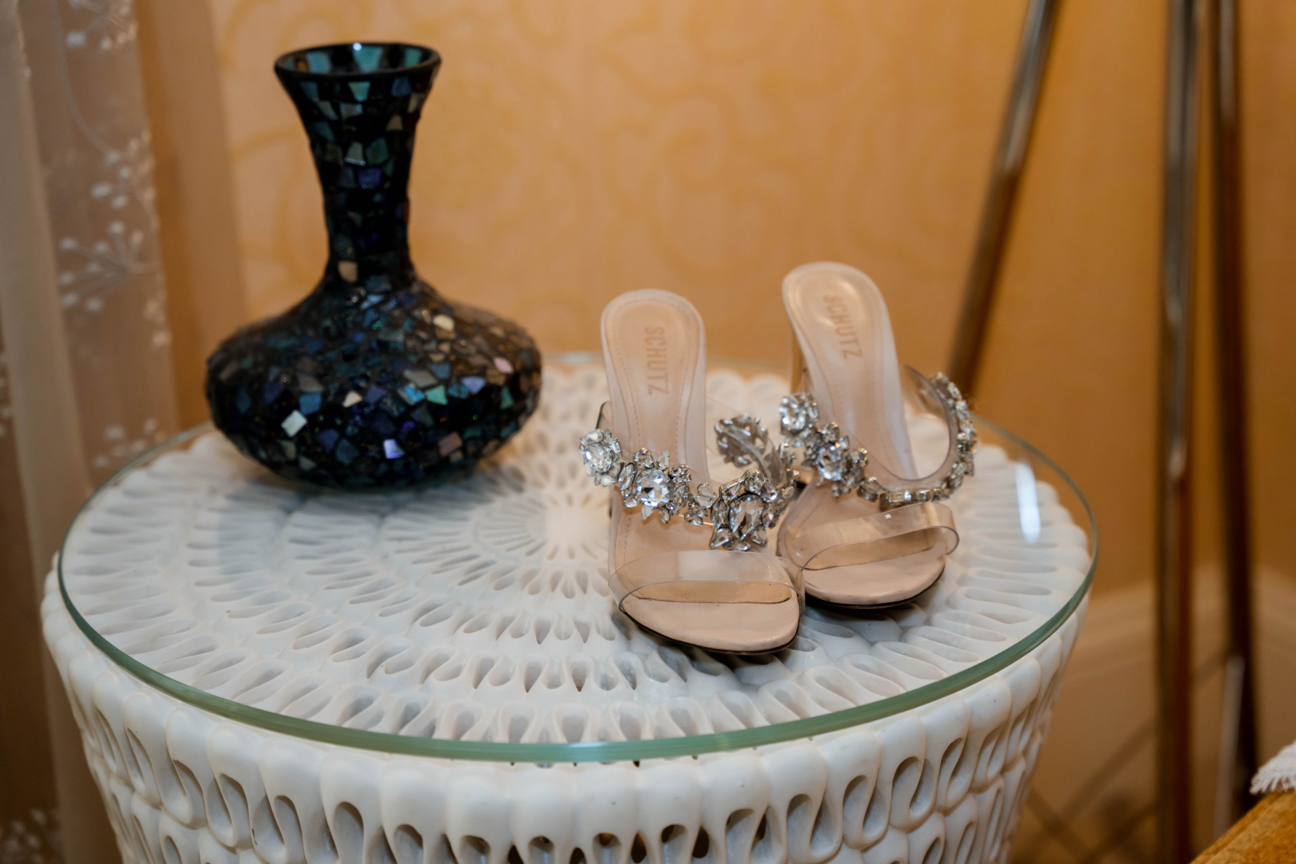 shoes and vase on endtable