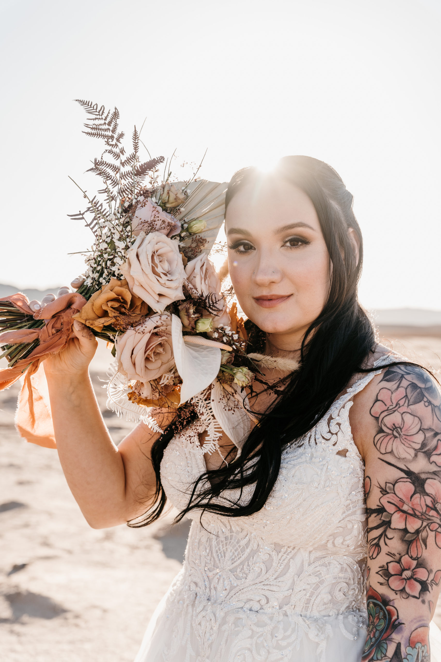 Bride holding up bouquet 