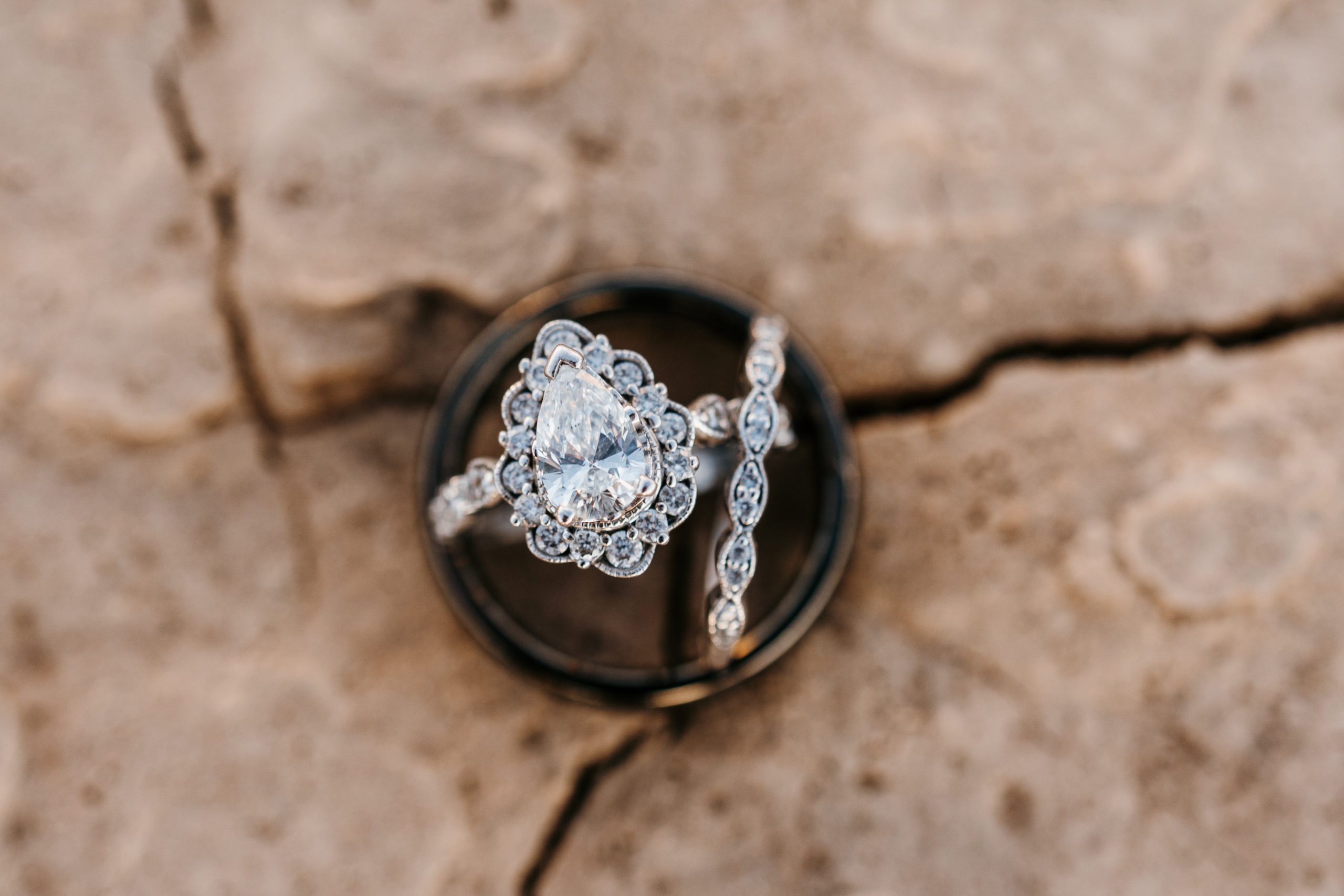 Bride's pear shaped wedding ring and band in Modern-Boho Las Vegas Elopement