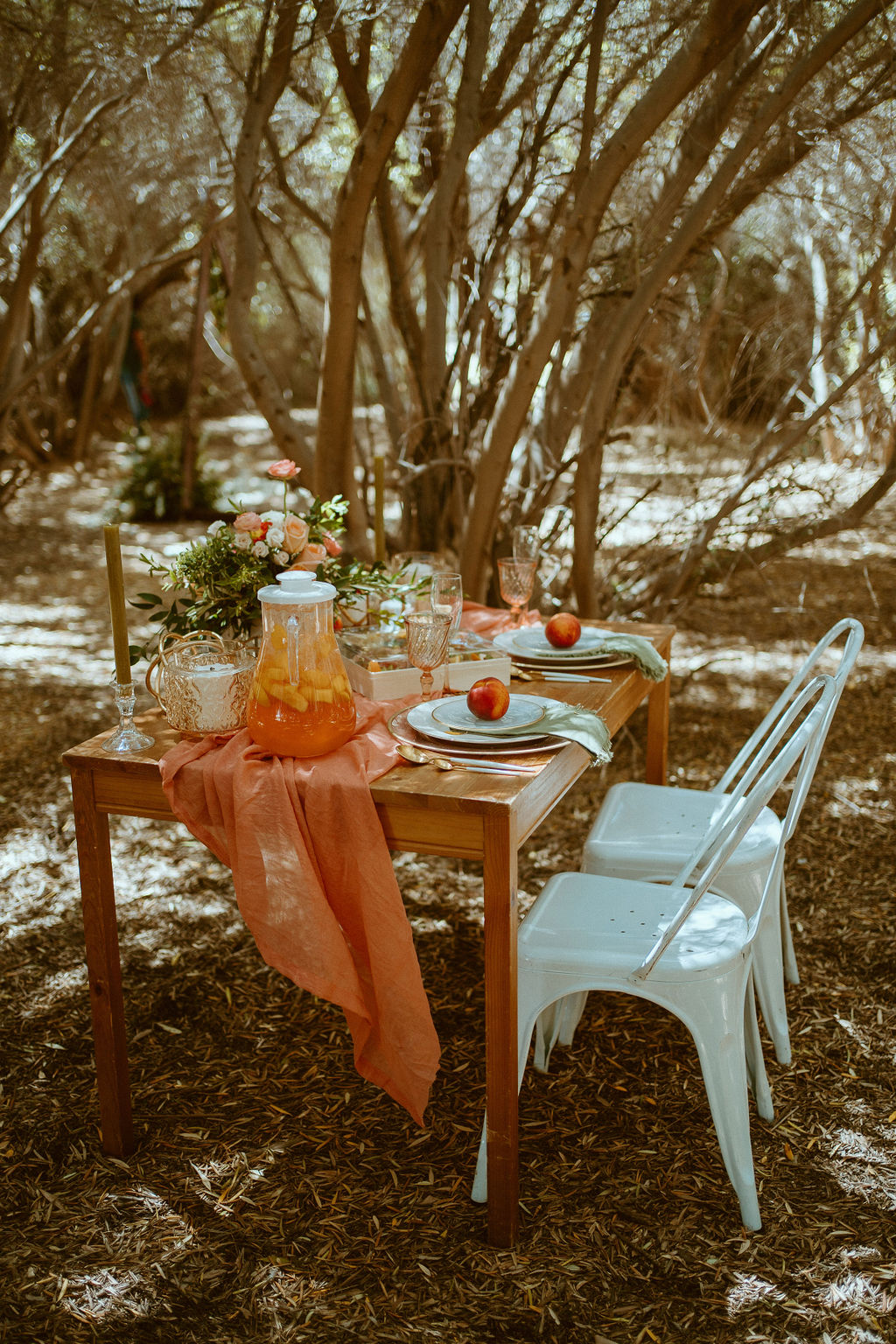 white chairs and peach linen for vintage wedding 