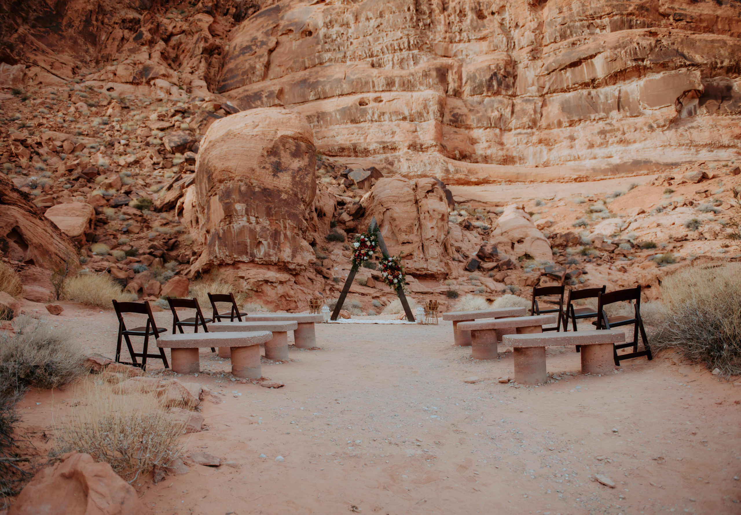 Ceremony Arch and Seating in Desert Elopement 