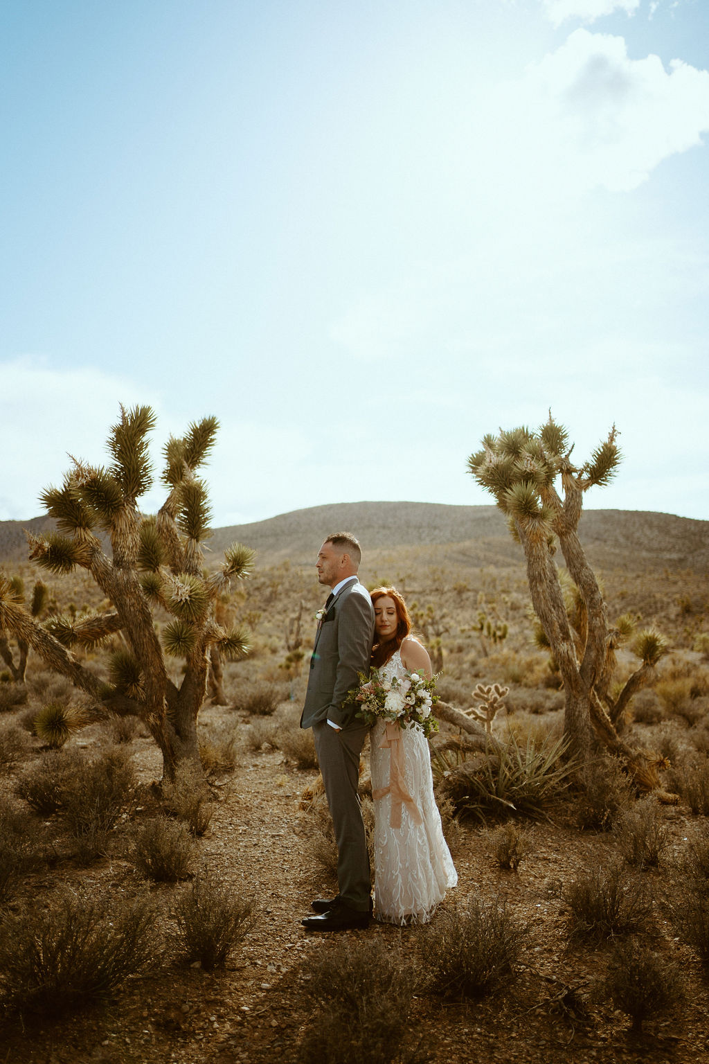 Elopement couple standing in Desert 