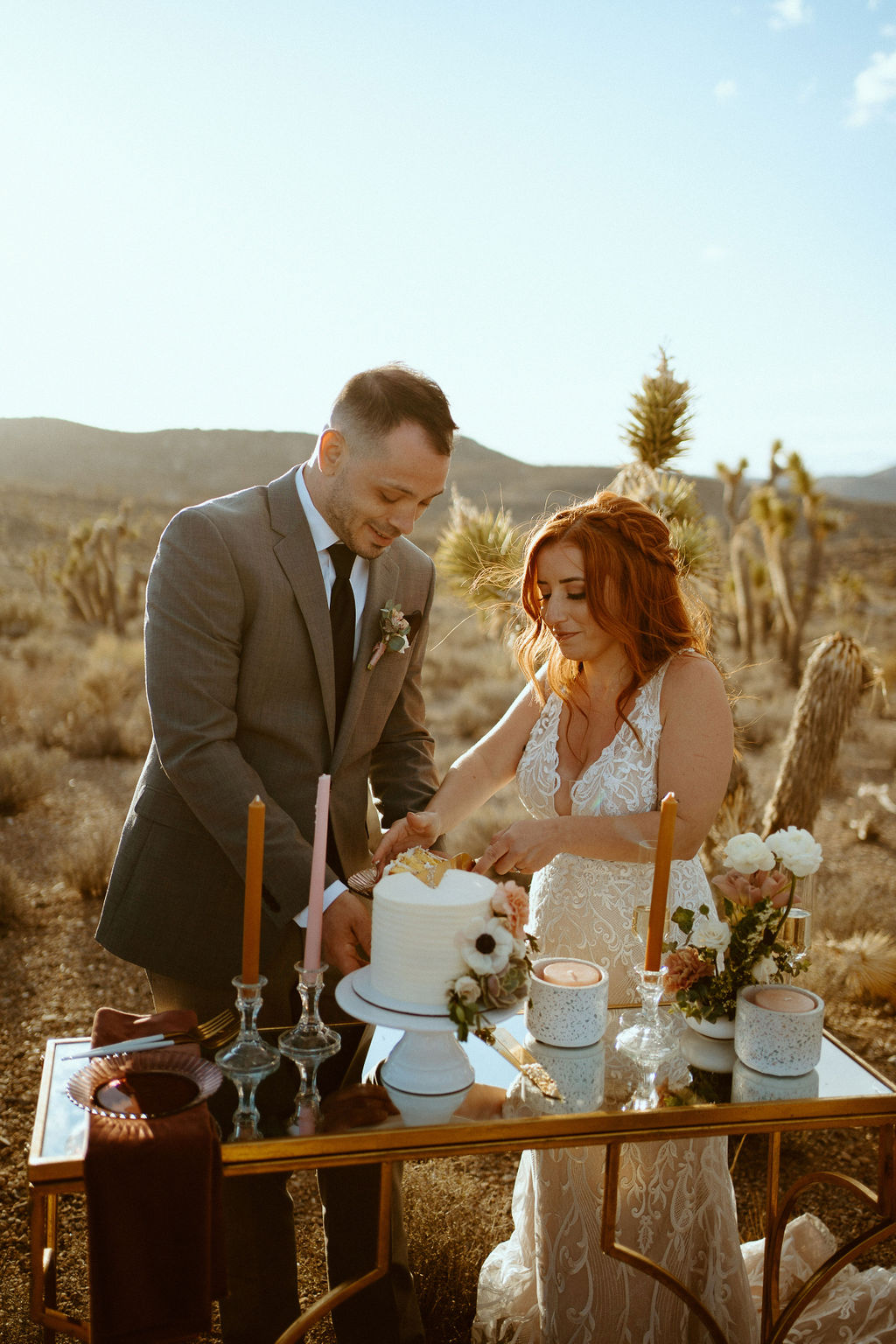 Husband and Wife Cutting Cake at Kyle Canyon Timeless Desert Elopement