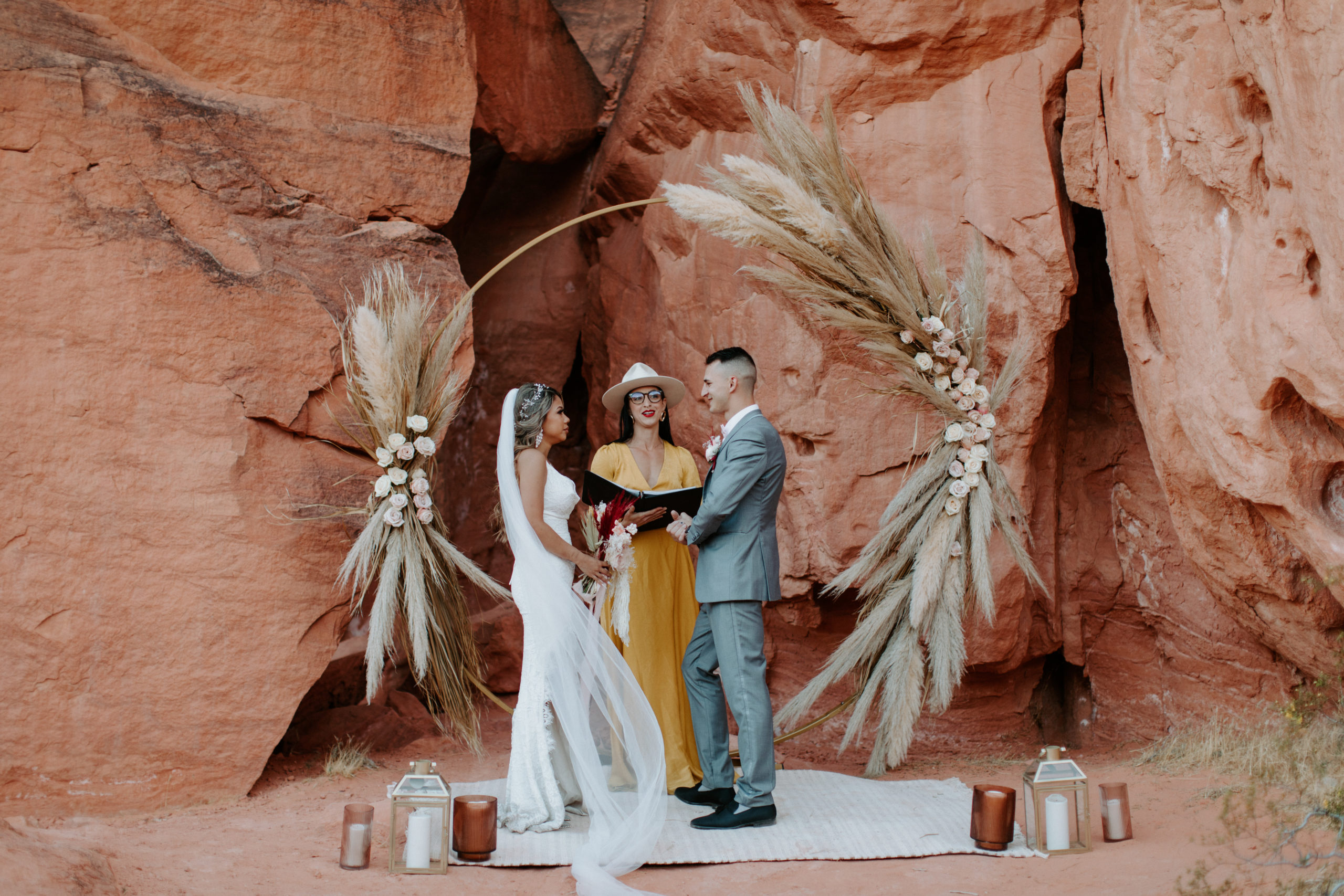 Bride and Groom during Ceremony for Boho Pampas Desert Elopement