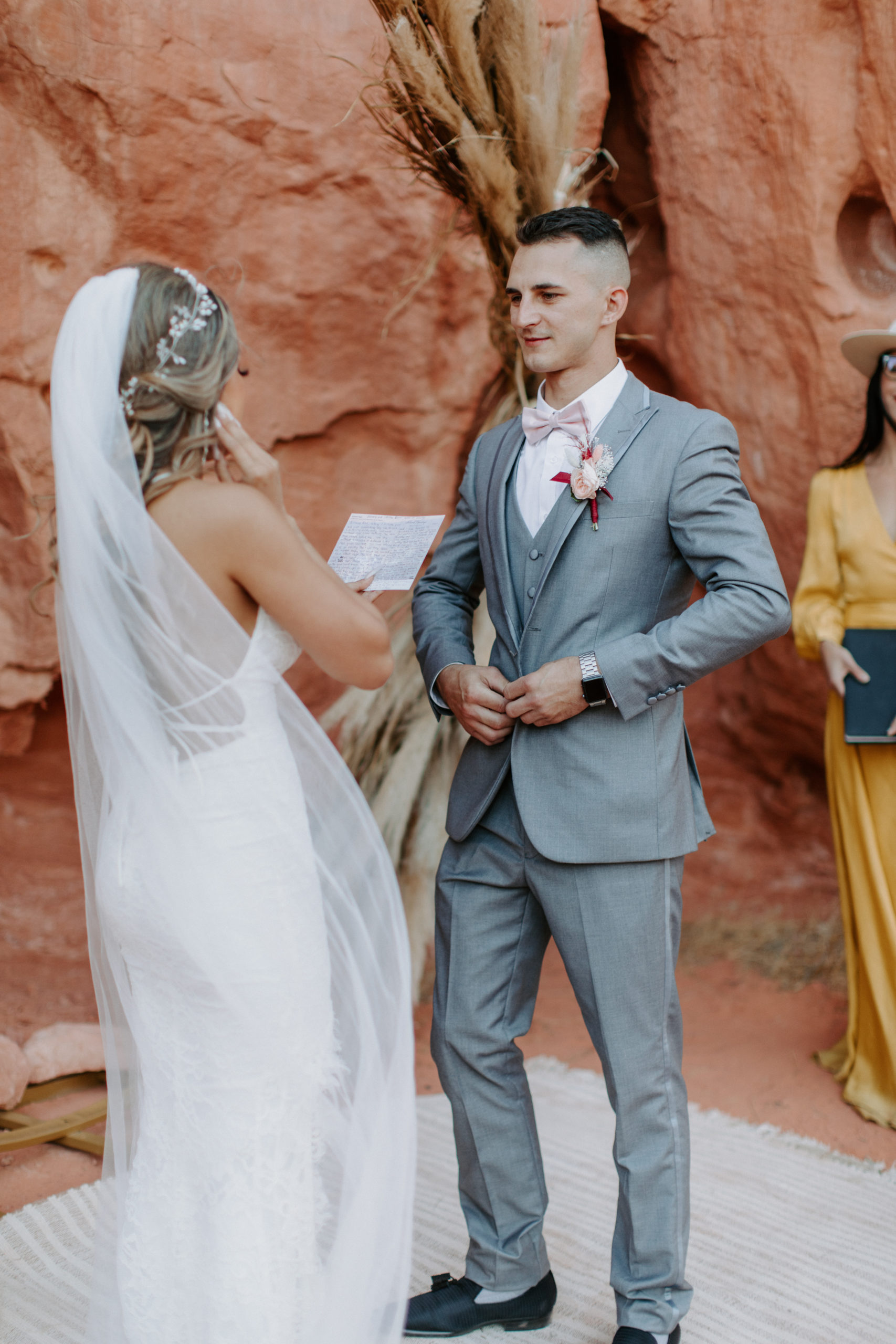 Bride reading vows to groom during Valley of Fire Elopement 