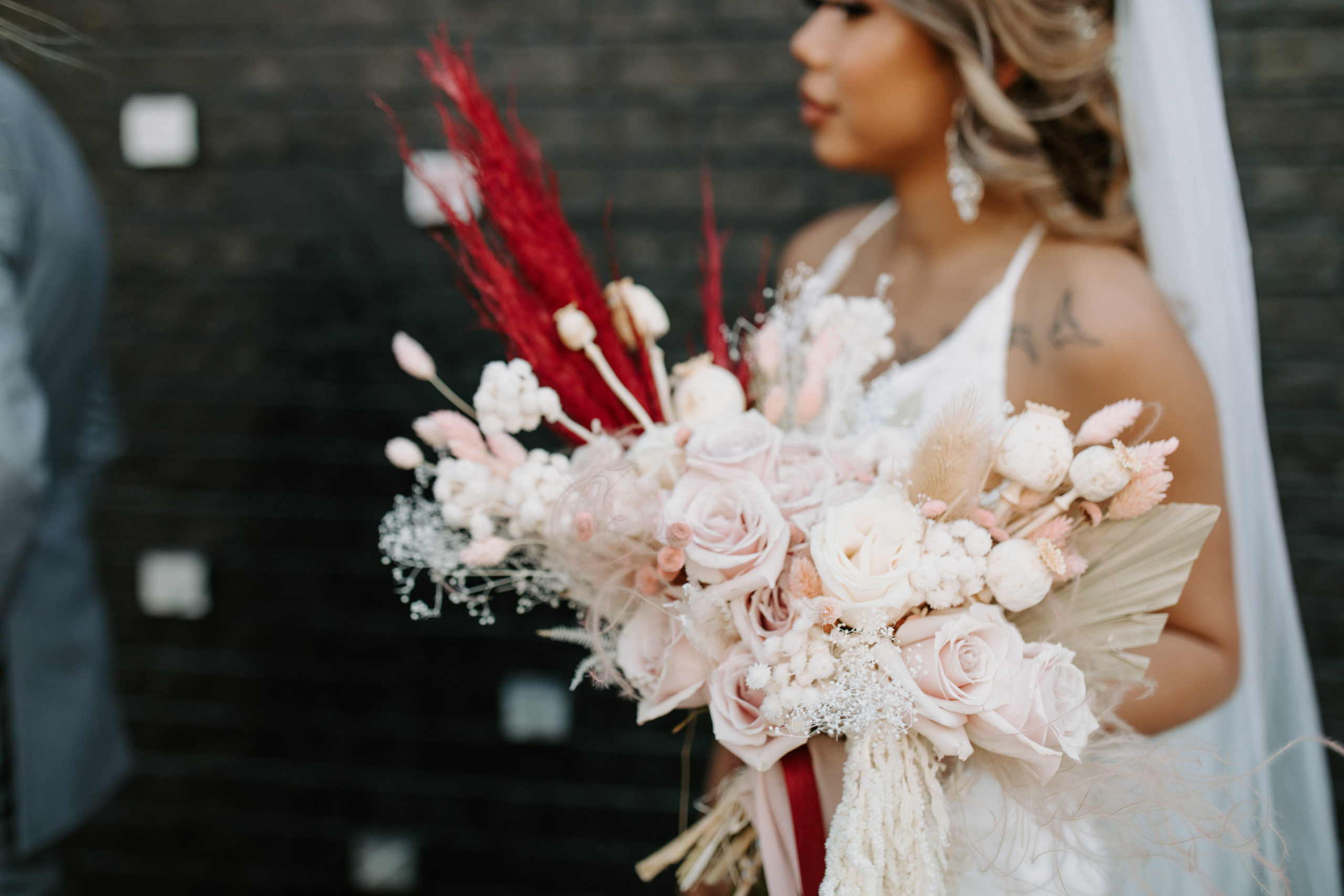 Monochromatic Light Pink Bouquet with Red Pampas Accent 