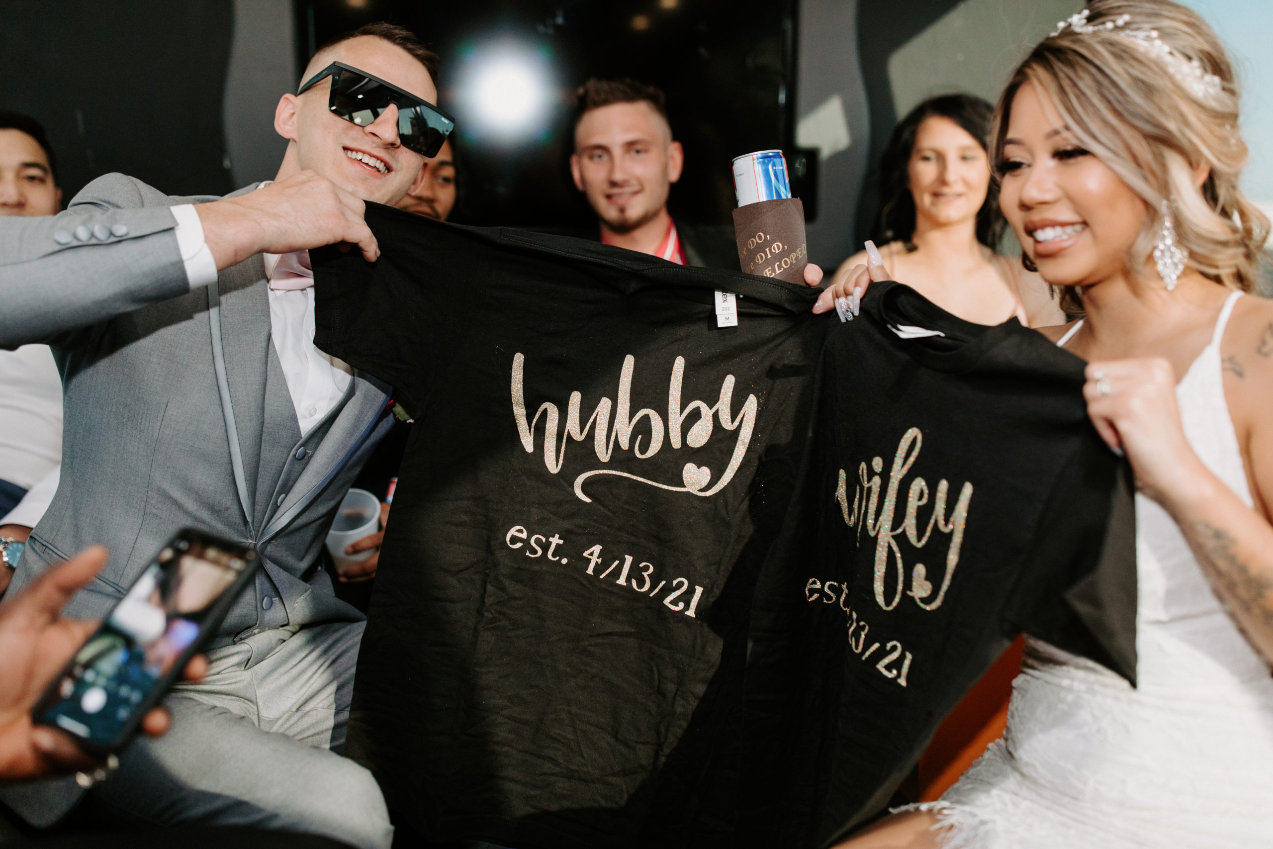 Bride and Groom receiving Hubby & Wifey Shirts 