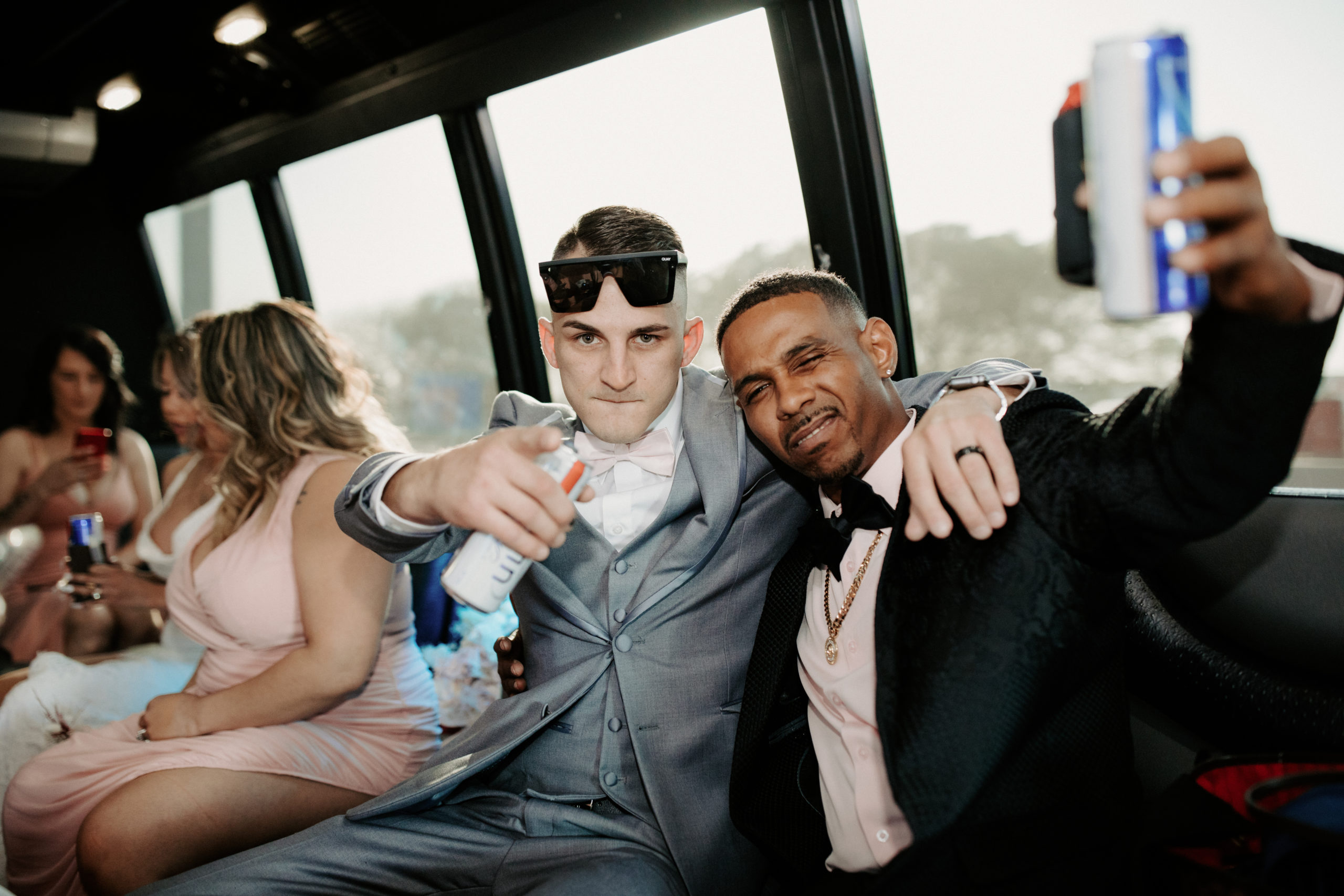Groom and friend on Party Bus on the way to Valley of Fire desert 