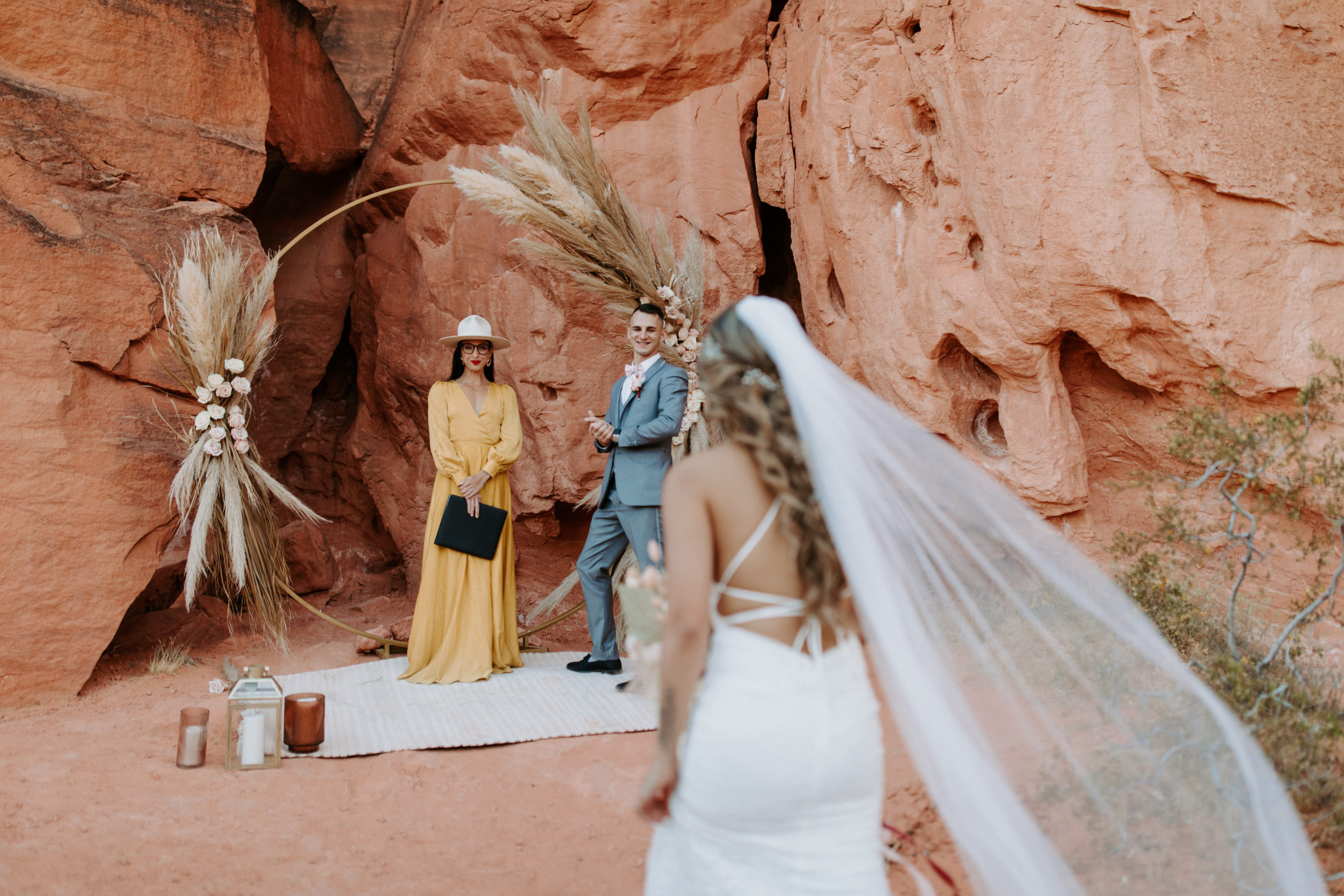 Bride walking down aisle for elopement in Valley of Fire 