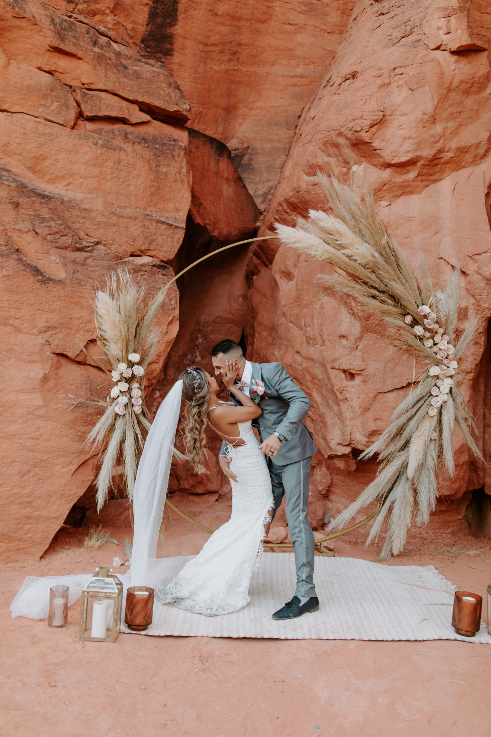 Newlyweds about to have first kiss during Boho Pampas Desert Elopement 
