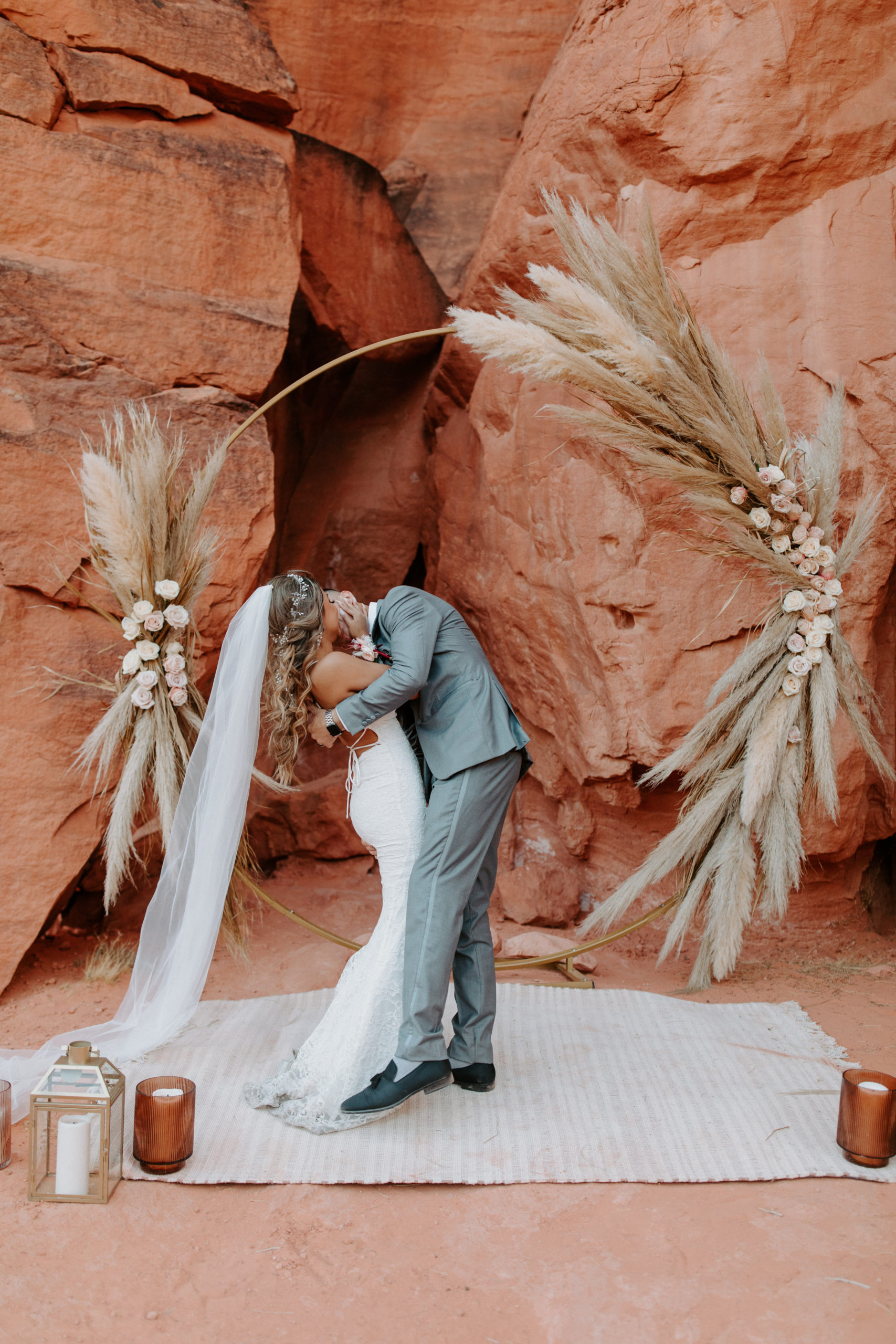 Newlyweds First Kiss During Boho Pampas Desert Elopement