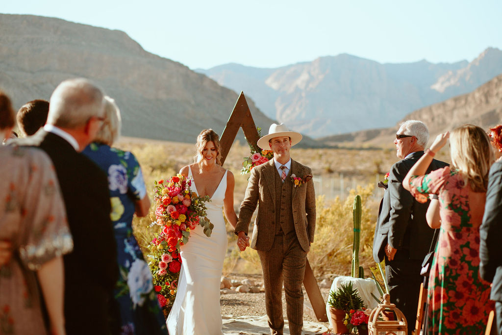 Newlyweds Exiting Las Vegas Desert Ceremony