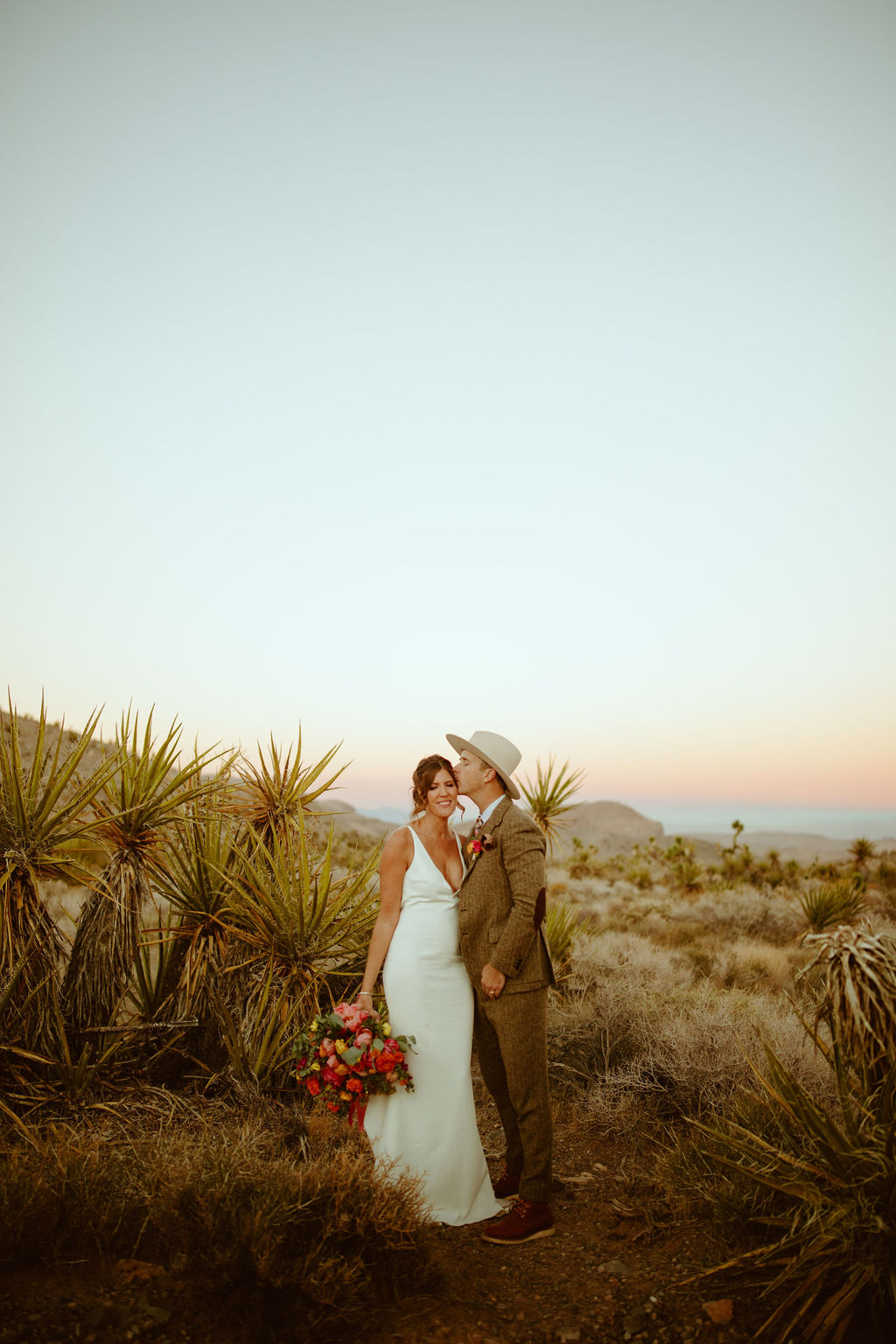 Newlyweds in Bright & Bold Sunset Desert Wedding in Las Vegas 