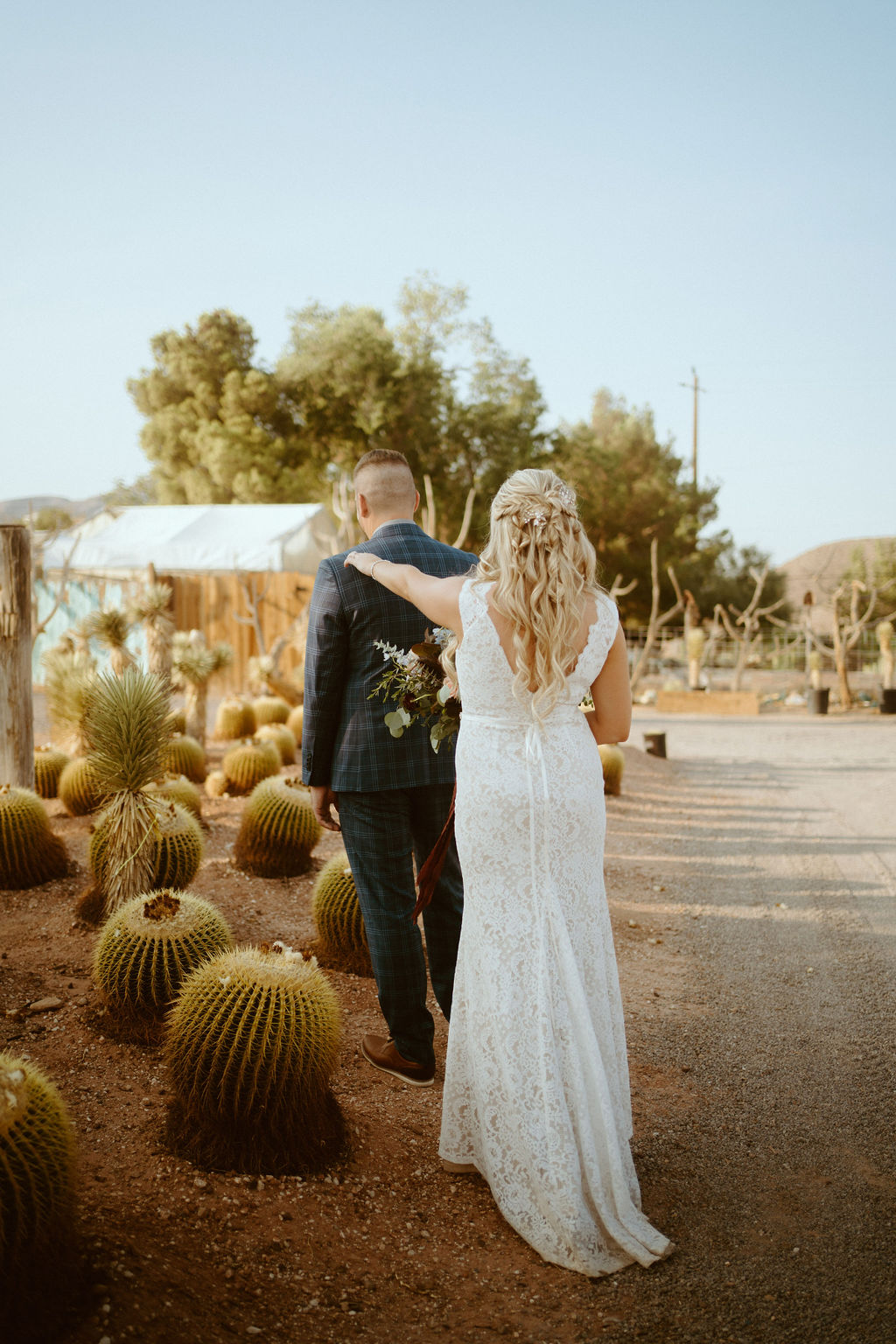 Bride tapping on Groom's Shoulder for First look at Cactus Joe's in Las Vegas  