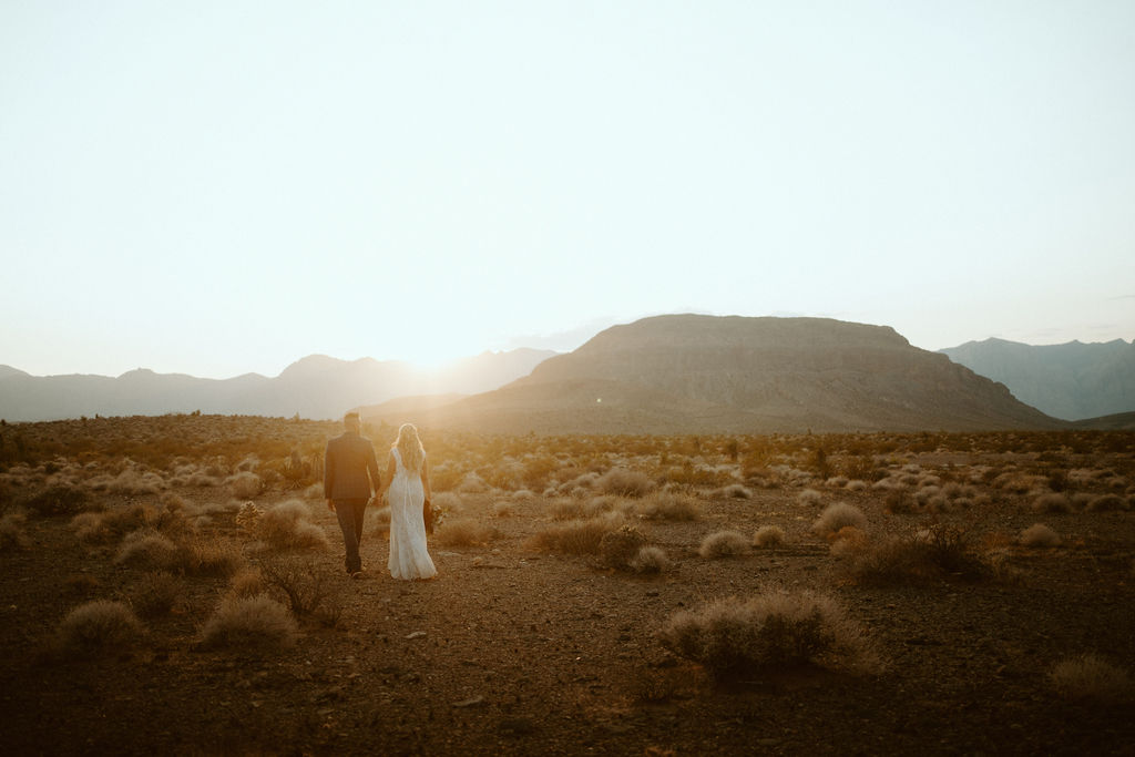 Bride and Groom Adventuring in Las Vegas Desert 