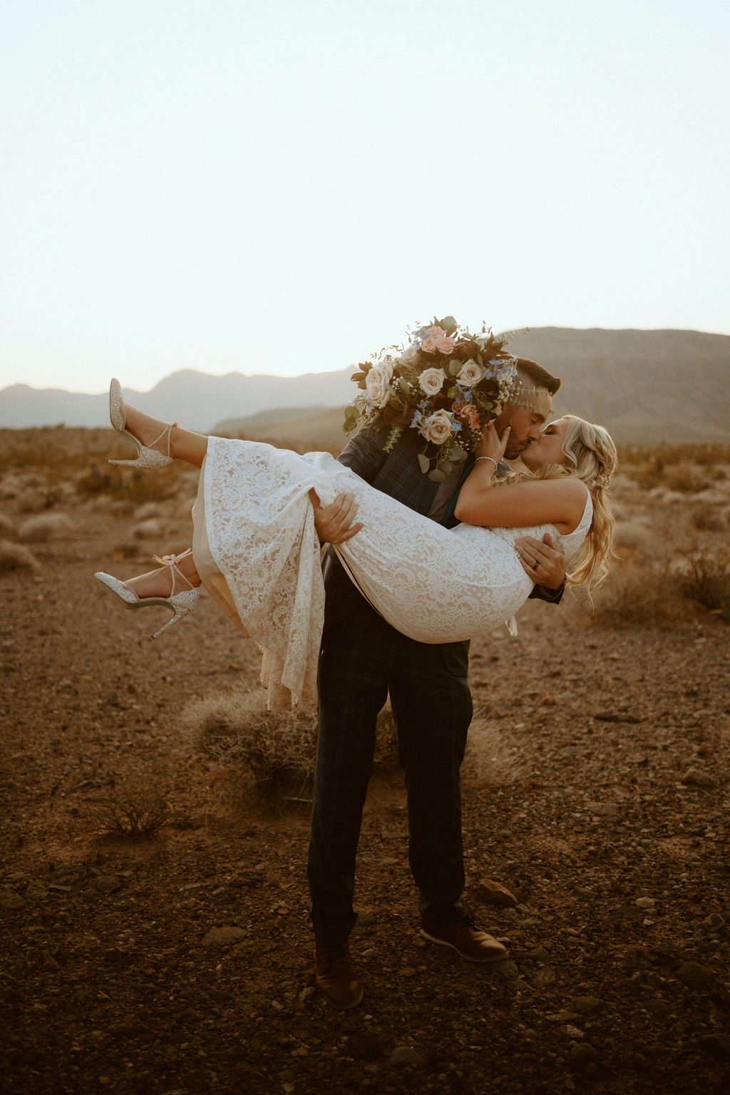 Groom Holding Bride and Kissing Her in Las Vegas 