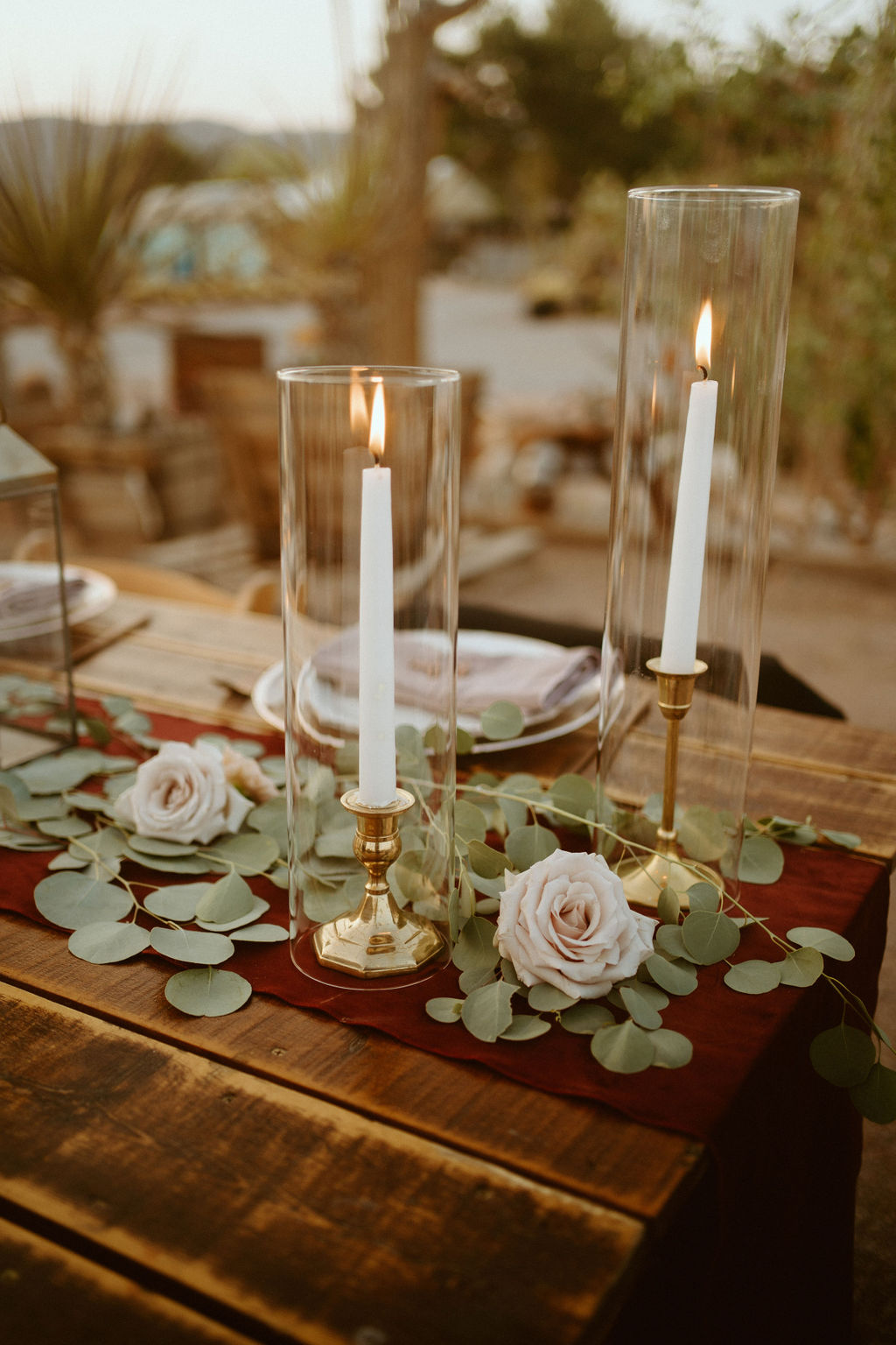 Taper Candles in Hurricane Glass with Linen and Sage for Micro-Wedding  for Outdoor Wedding Reception 