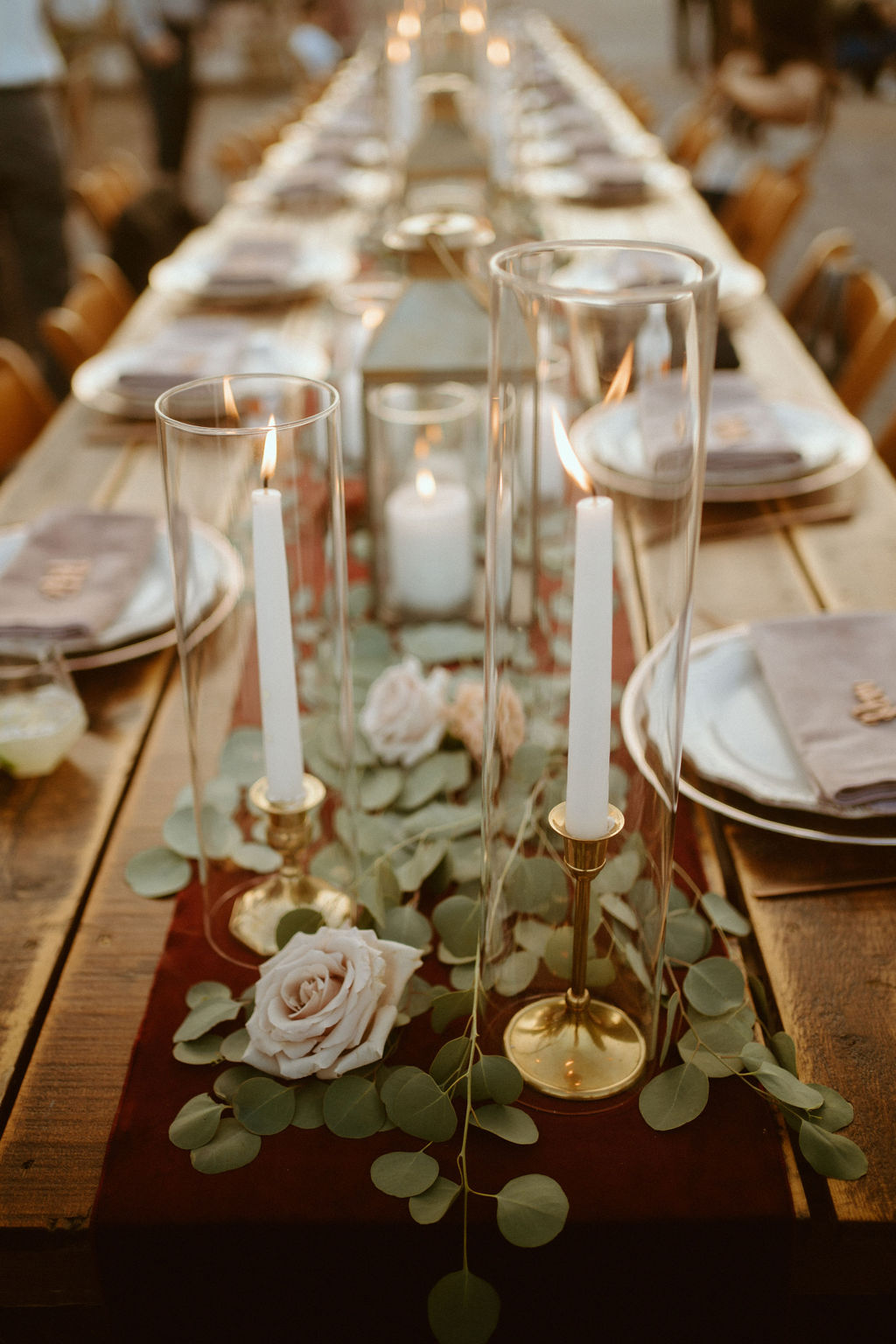 Long Reception Table with Hurricane Glass and Sage for Micro-Wedding 