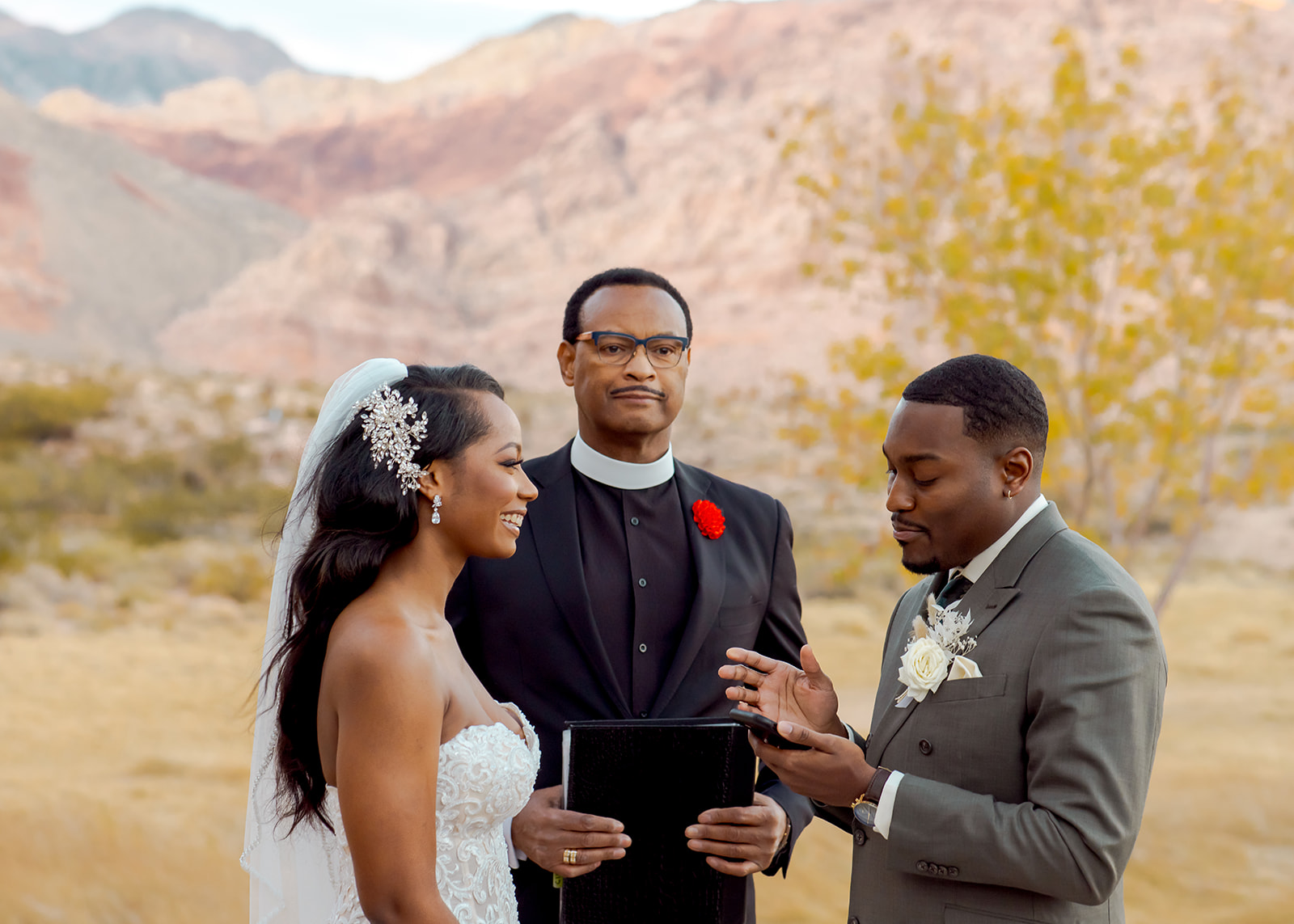 Groom reading his personal vows to the bride at Red Rock Canyon in Las Vegas 