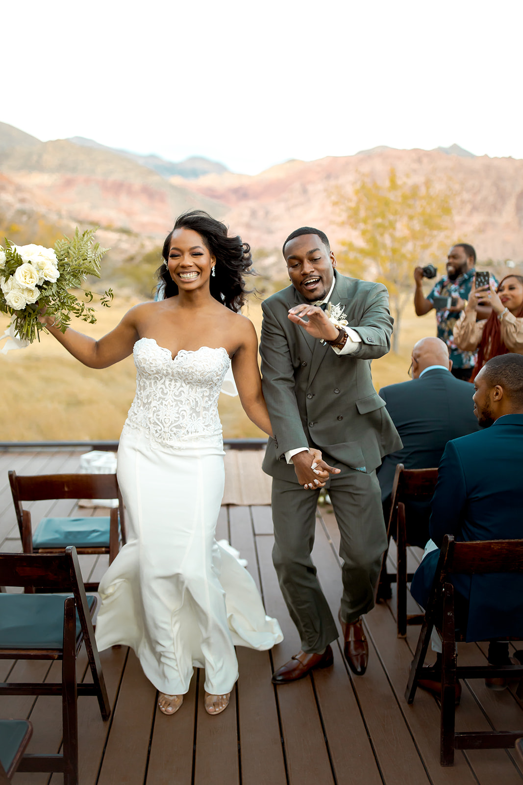 Newlyweds dancing down the aisle after getting eloped in Las Vegas 