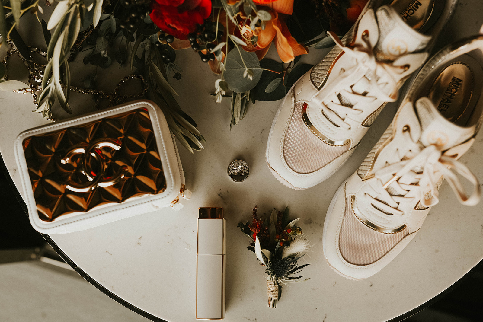 Wedding Details of Rings, Michael Kors Sneakers, Gold Chanel Purse, Fall Inspired Bouquet & Boutonniere in Dry Lake Bed Fall Inspired Elopement 