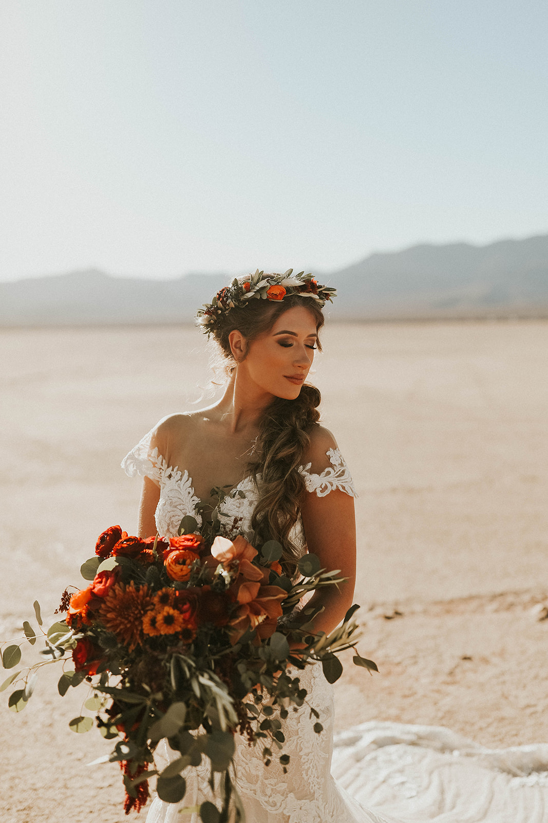Bride with Floral Crown & Holding Bouquet before Ceremony in Dry Lake Bed Fall Inspired Elopement 