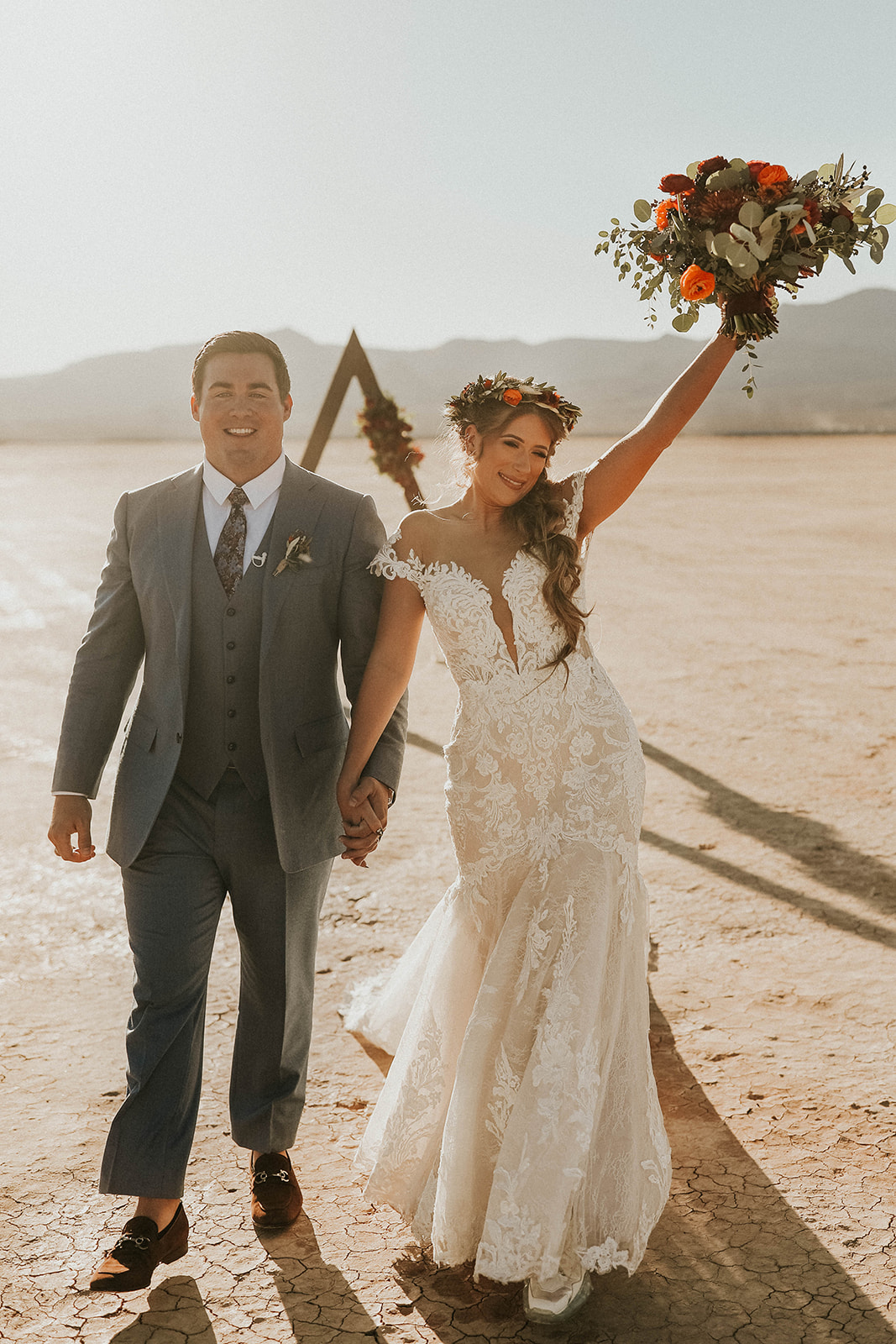Bride and Groom Exiting Ceremony during their Dry Lake Bed Fall Inspired Elopement 