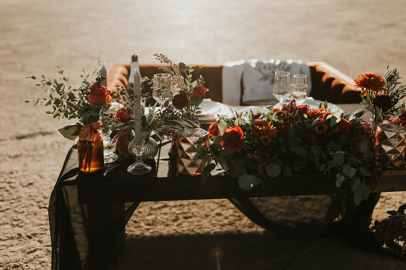 Dry Lake Bed Fall Inspired Elopement Sweetheart Table with Velvet Couch & Fall Inspired Floral 