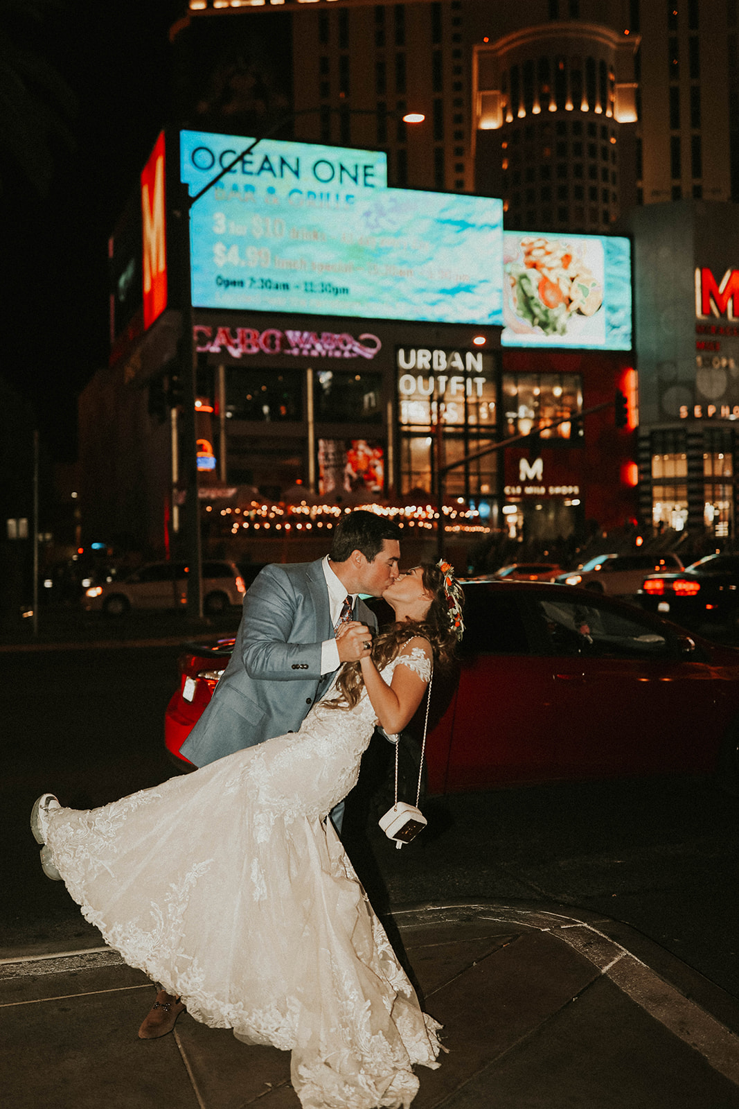 Couple Kissing in Street on the Las Vegas Strip after Dry Lake Bed Fall Inspired Elopement