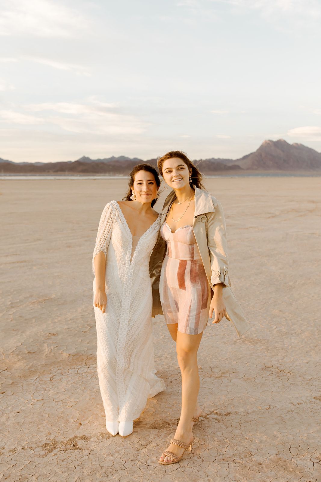 Bride with Guest on Dry Lake Bed 
