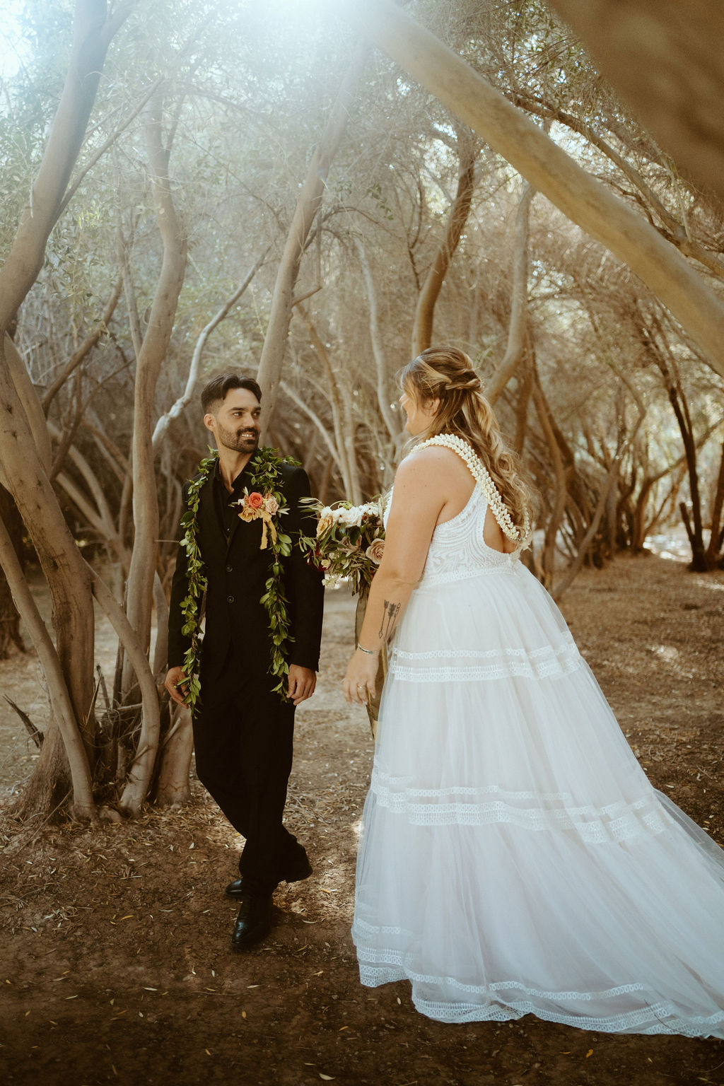 Grooms Reaction in First look in Olive Grove during GreenGale Farms Hawaiian Elopement