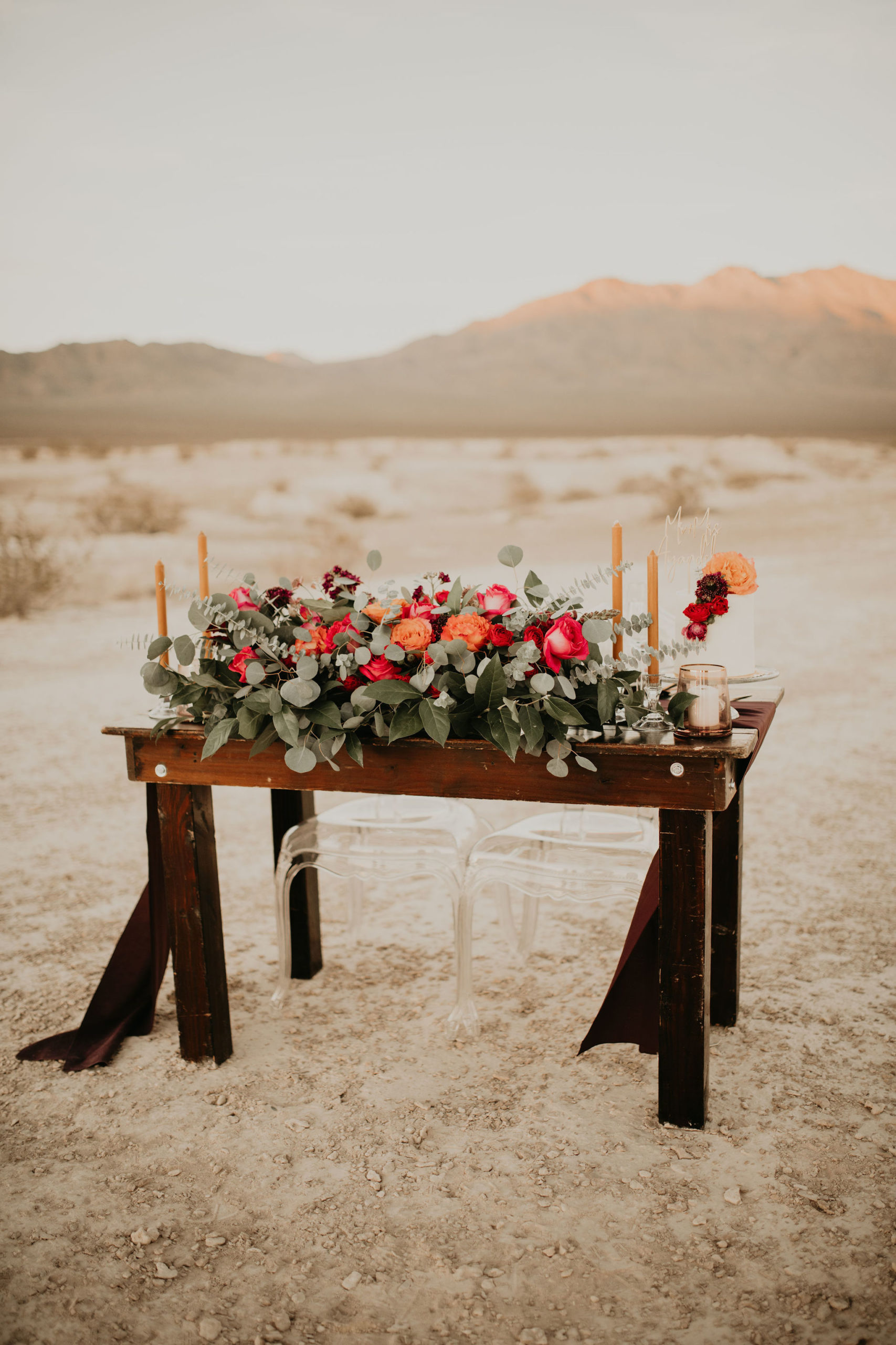 Jewel Tone Las Vegas Elopement Sweetheart Table with Floral and Candles 