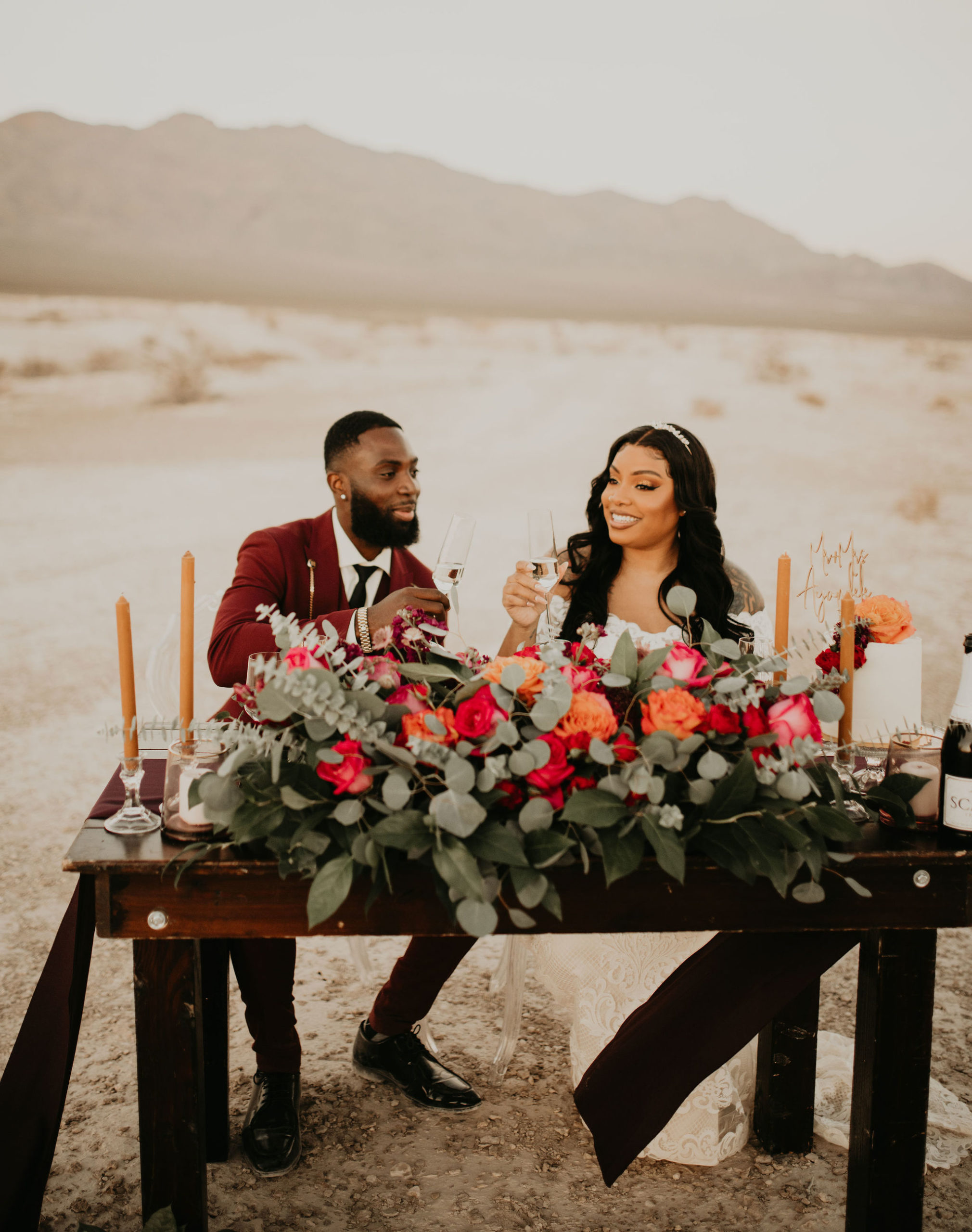 Couple Enjoying Champagne at Sweetheart Table 