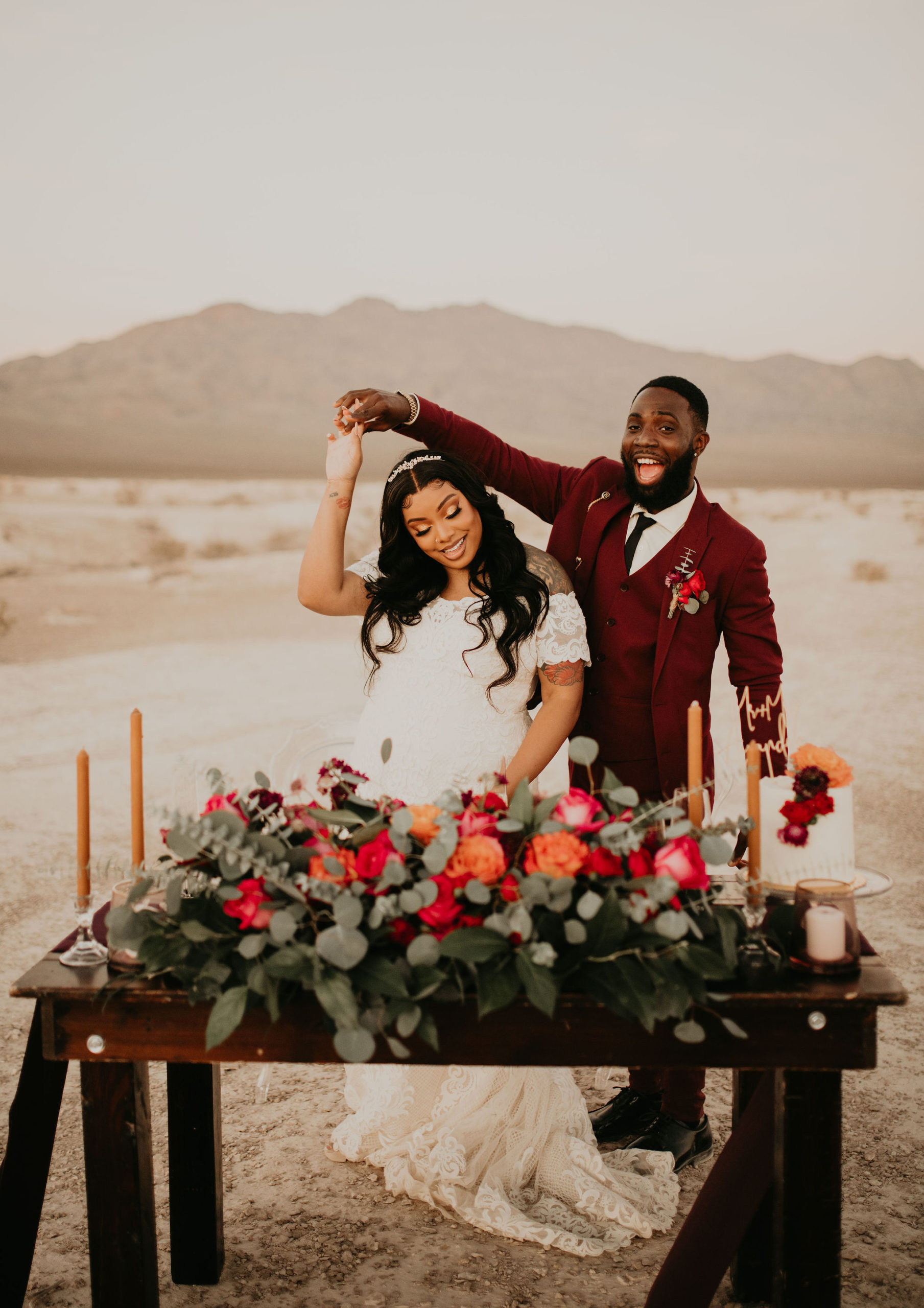 Newlyweds Dancing in Desert at Sweetheart Table after getting Eloped 