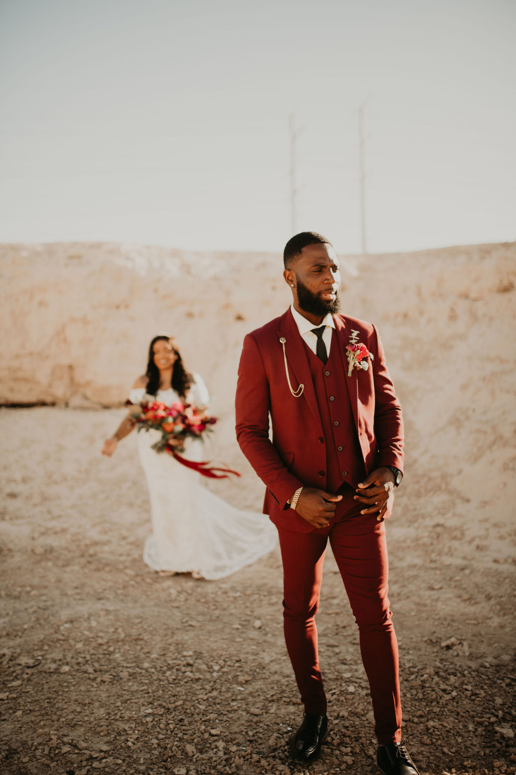 Bride Approaching Groom during First Look in Desert 