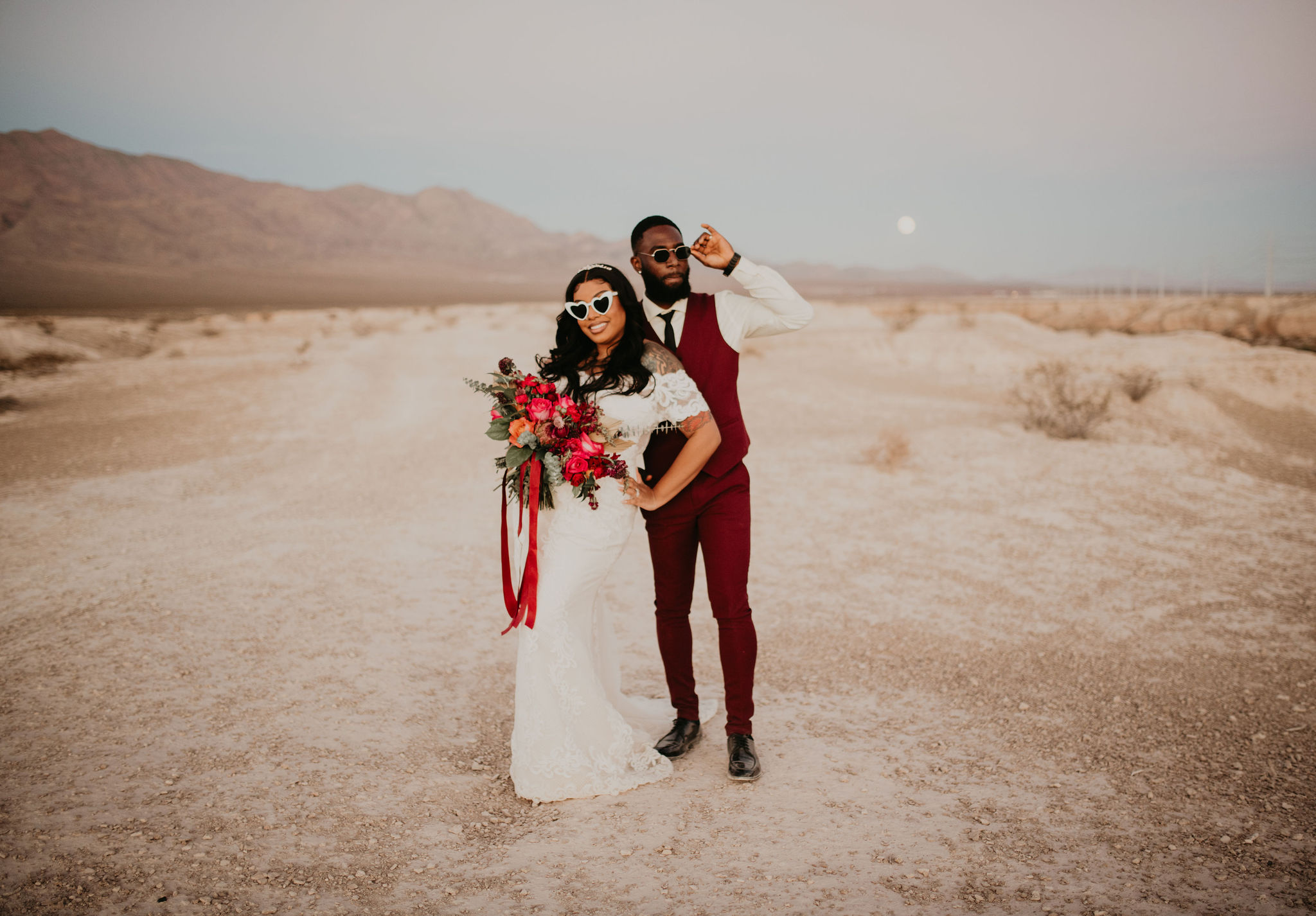 Couple in Sunglasses in Desert after Las Vegas Ceremony 