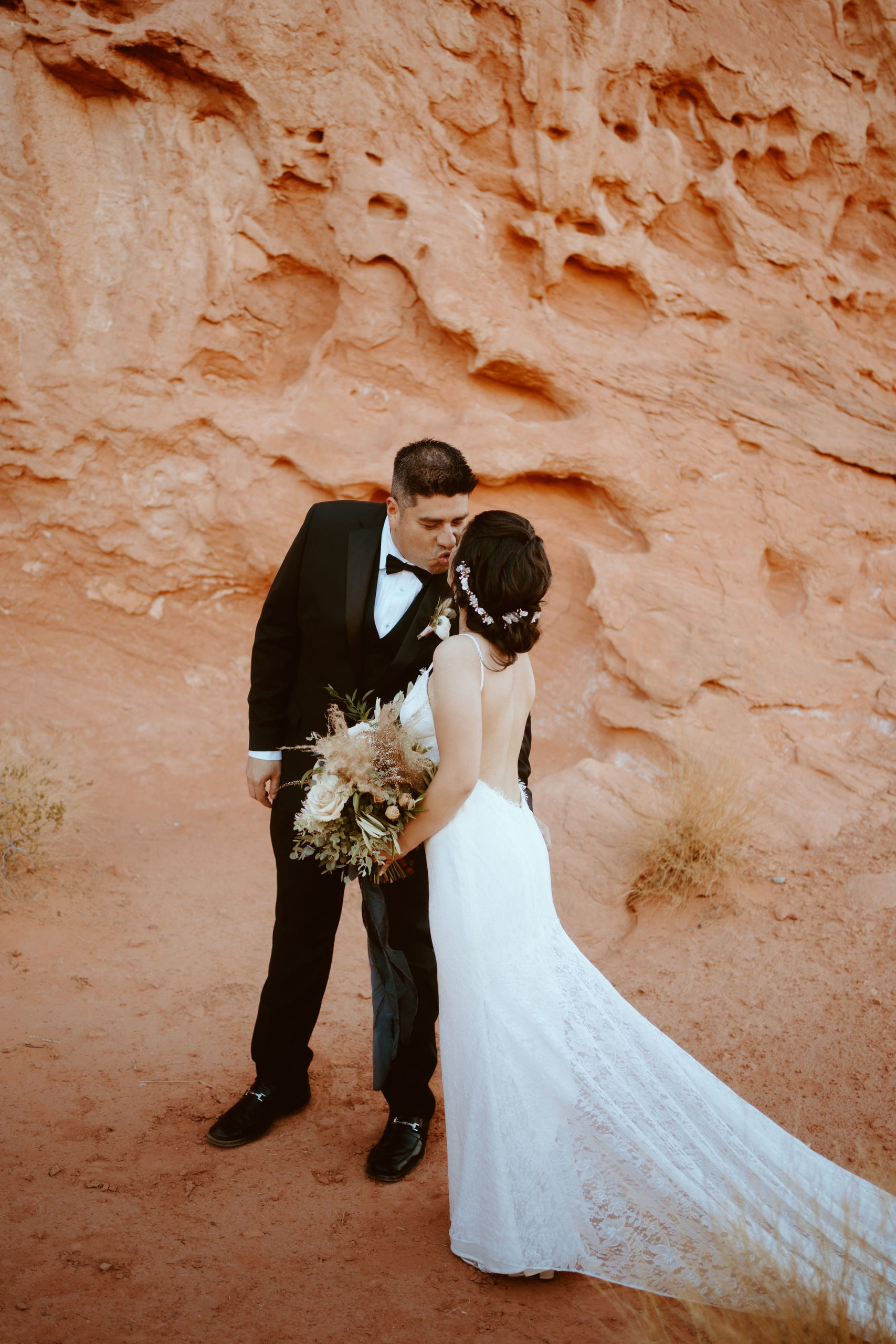 Couples Kisses after seeing each other for First Look before their Just Outside of Las Vegas Elopement 