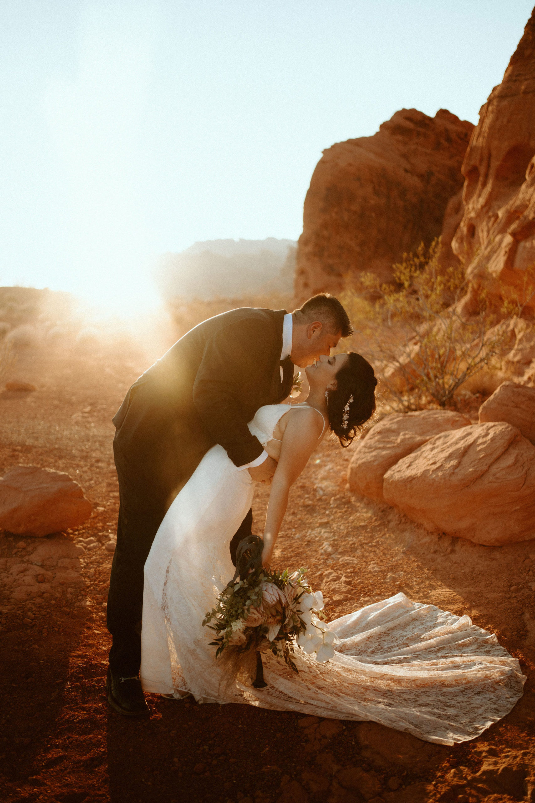Groom dipping the Bride during Valley of Fire Sunset 