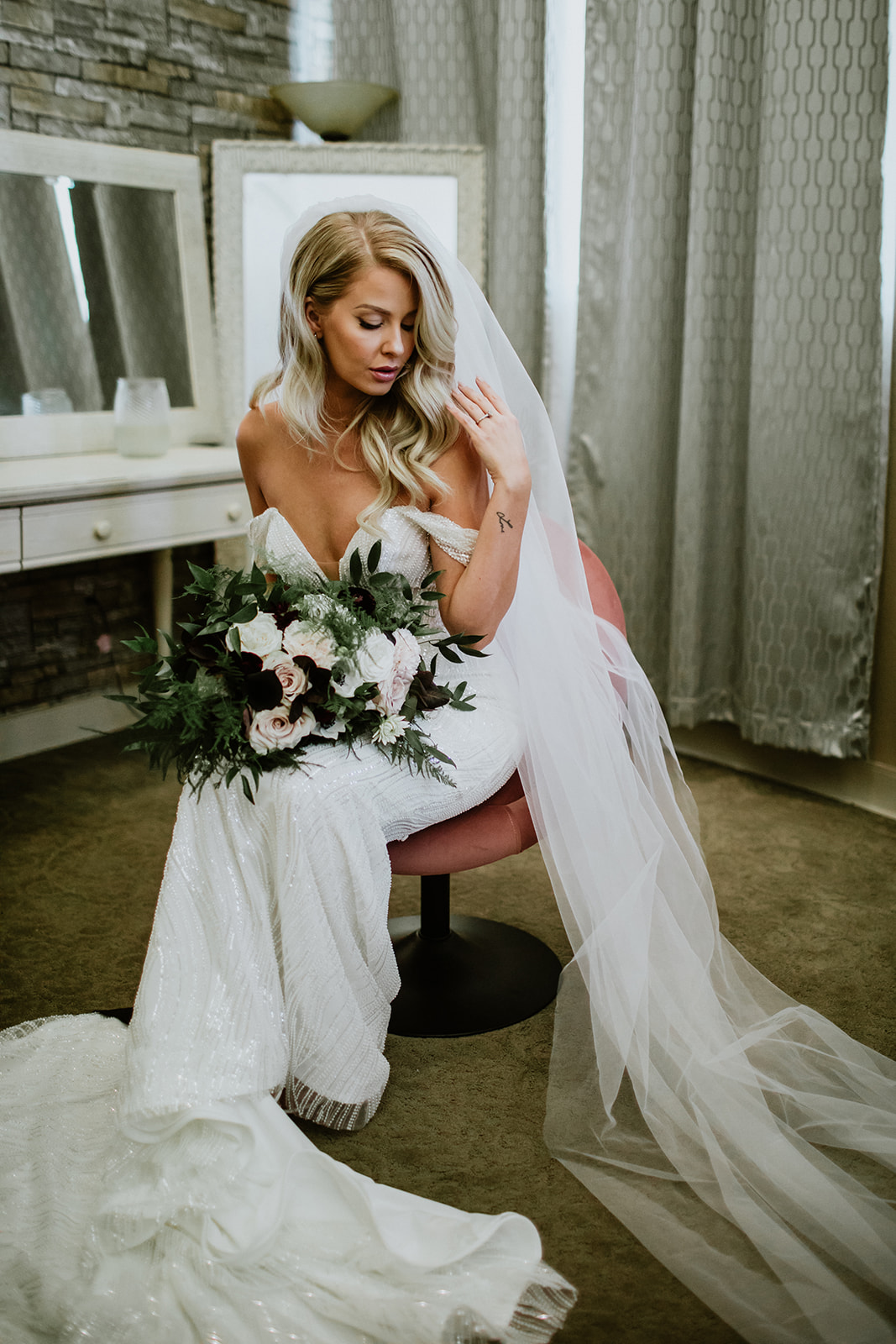 Bride with Veil holding Moody Bouquet in Bridal Suite before Moody Modern Glam Lotus House Wedding 