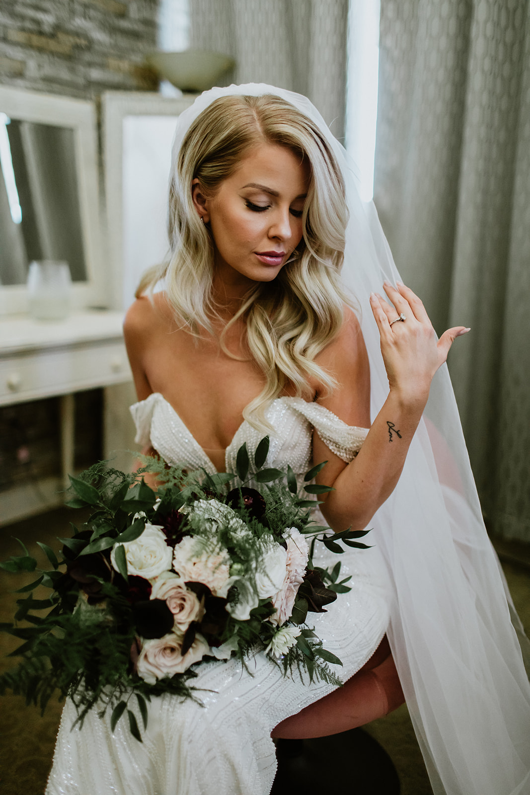 Bride in off the shoulder detailed dress with White Blush and Black Bouquet with for Moody Glam 