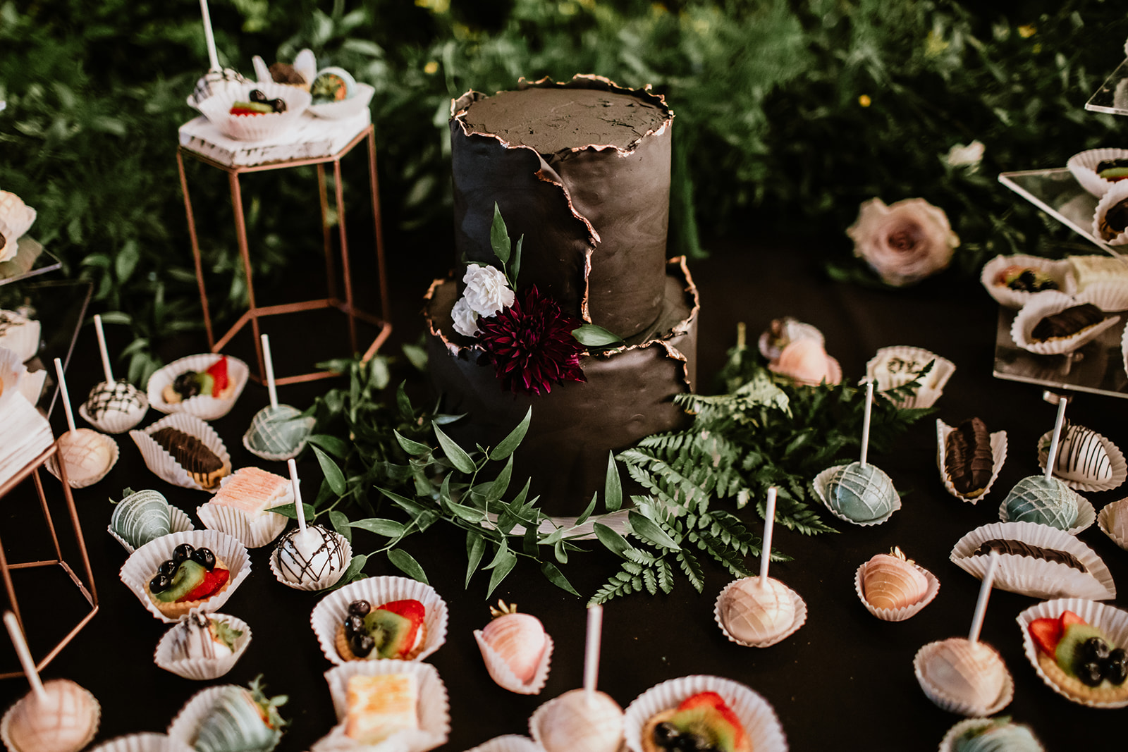 Dessert table with cake pops for wedding reception 