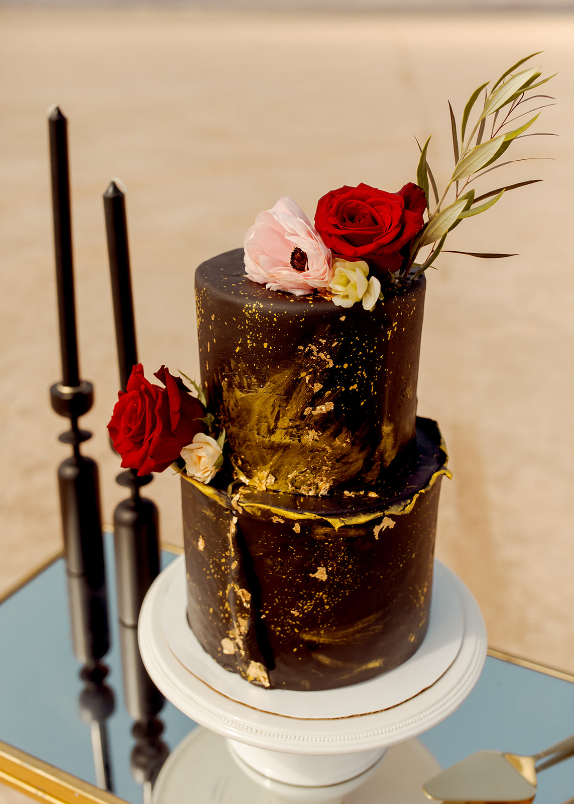 Moody Elopement Cake Table with Black & Gold Two-Tier Cake & Black Taper Candles 
