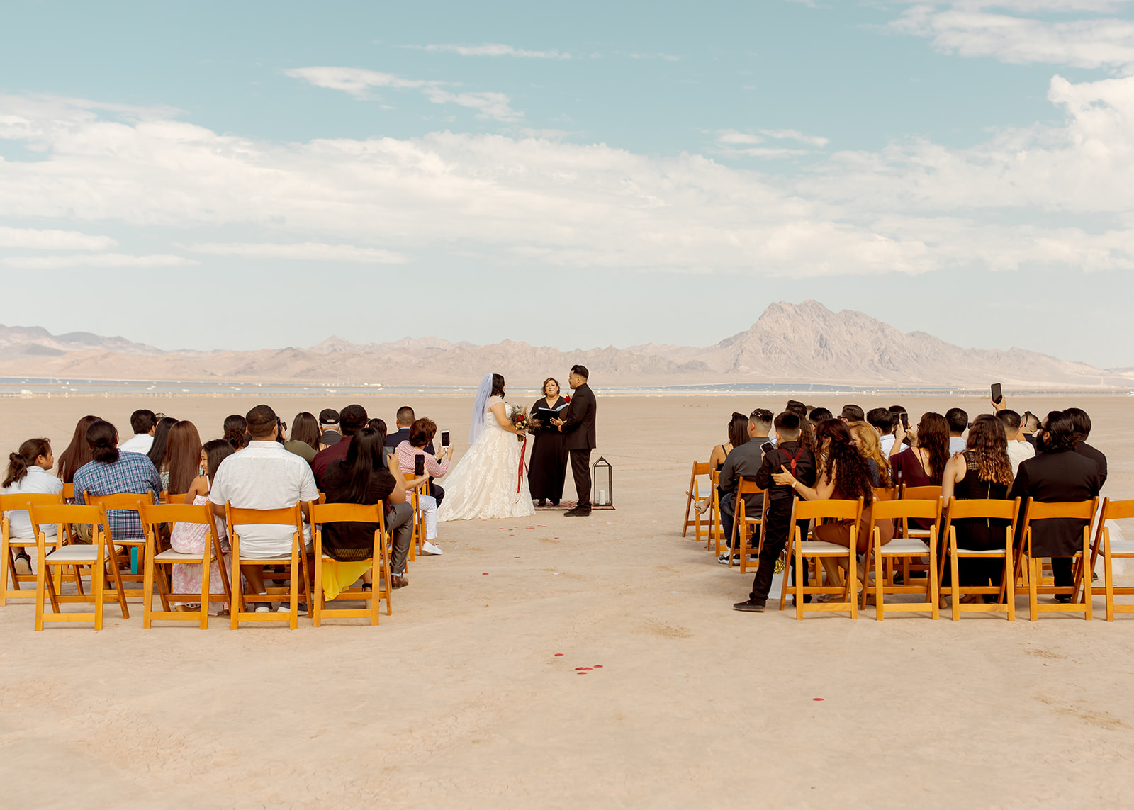 Couple getting Married in Moody Dry Lake Bed Elopement with Guests 