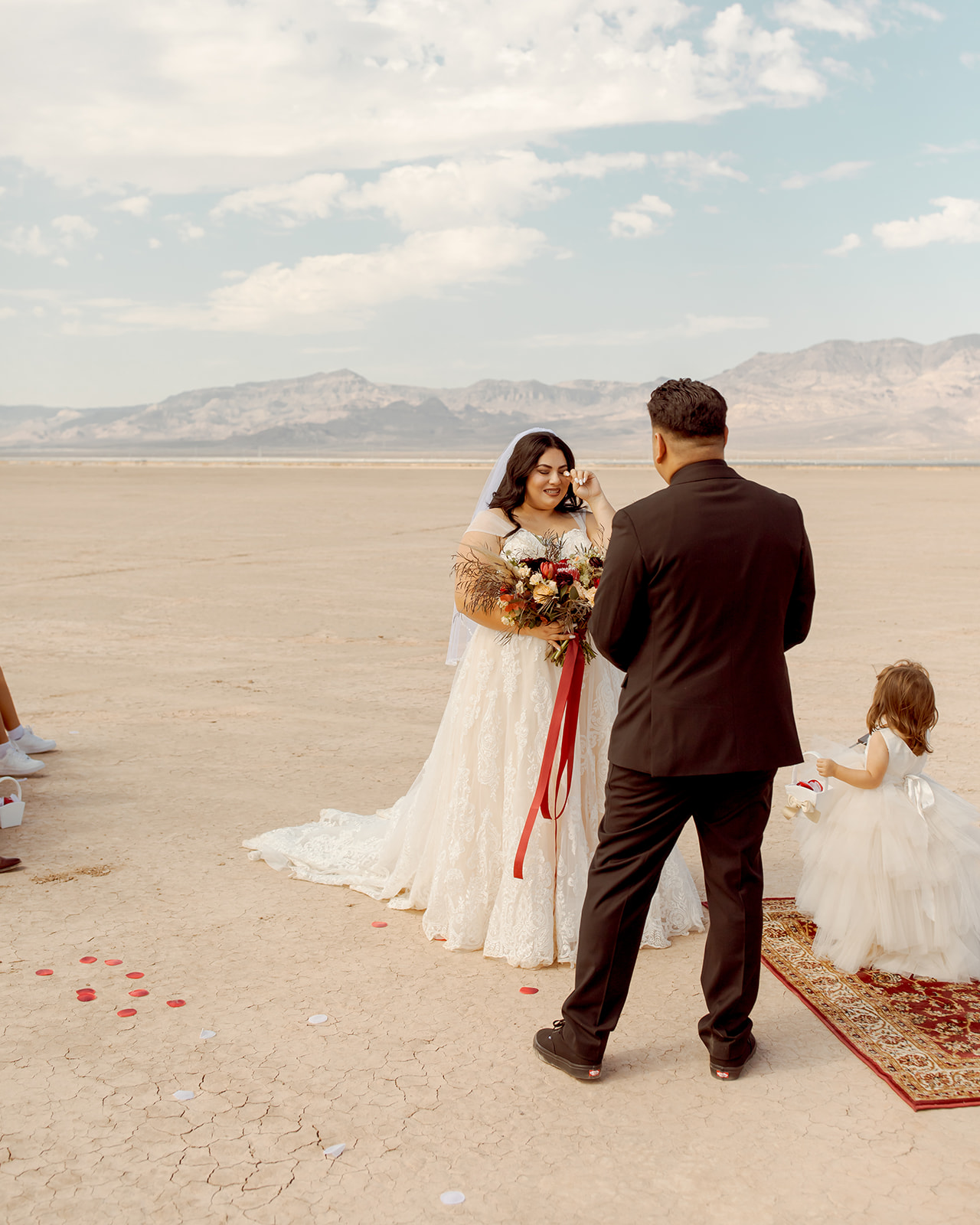 Bride Tearing up at Altar in Moody Dry Lake Bed Elopement 