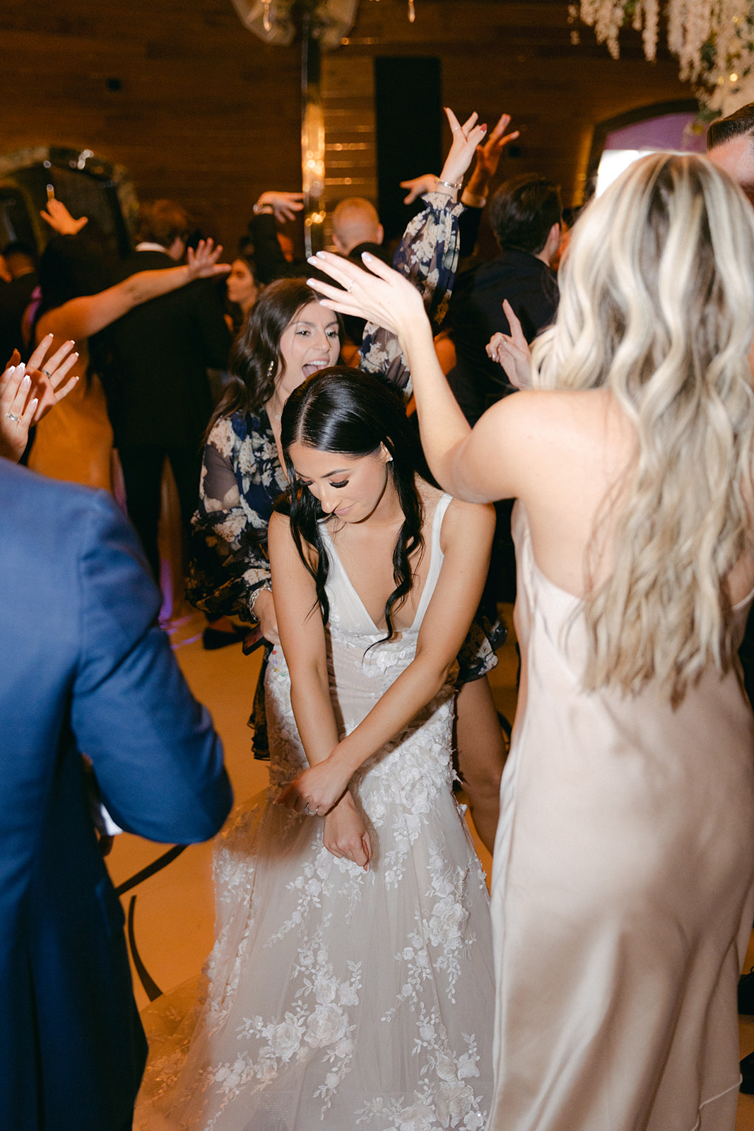 Bride dancing with guests during Red Rock Casino Timeless Modern Wedding 