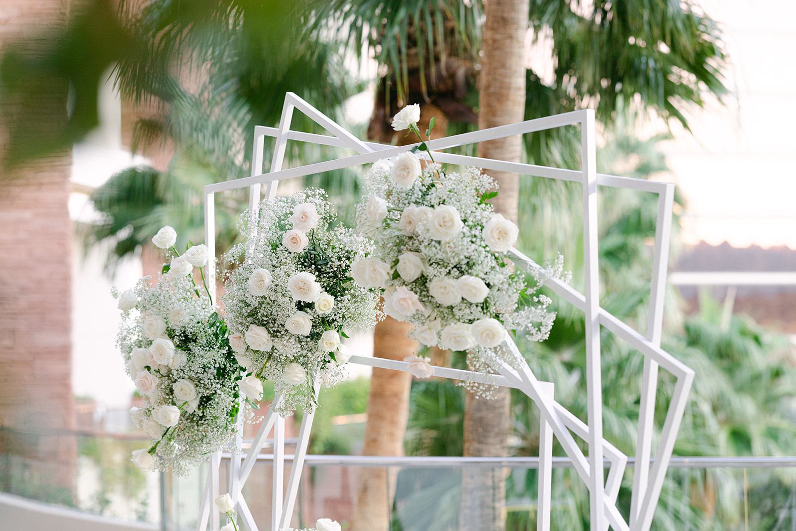 White rose and baby's breath floral attachments for modern arch 