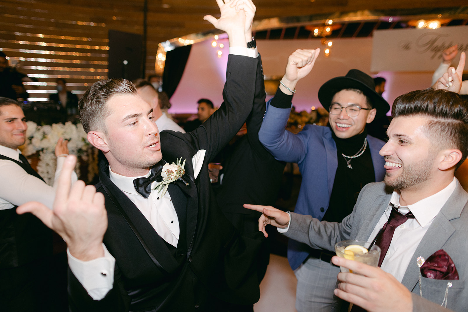 Groom dancing during reception 